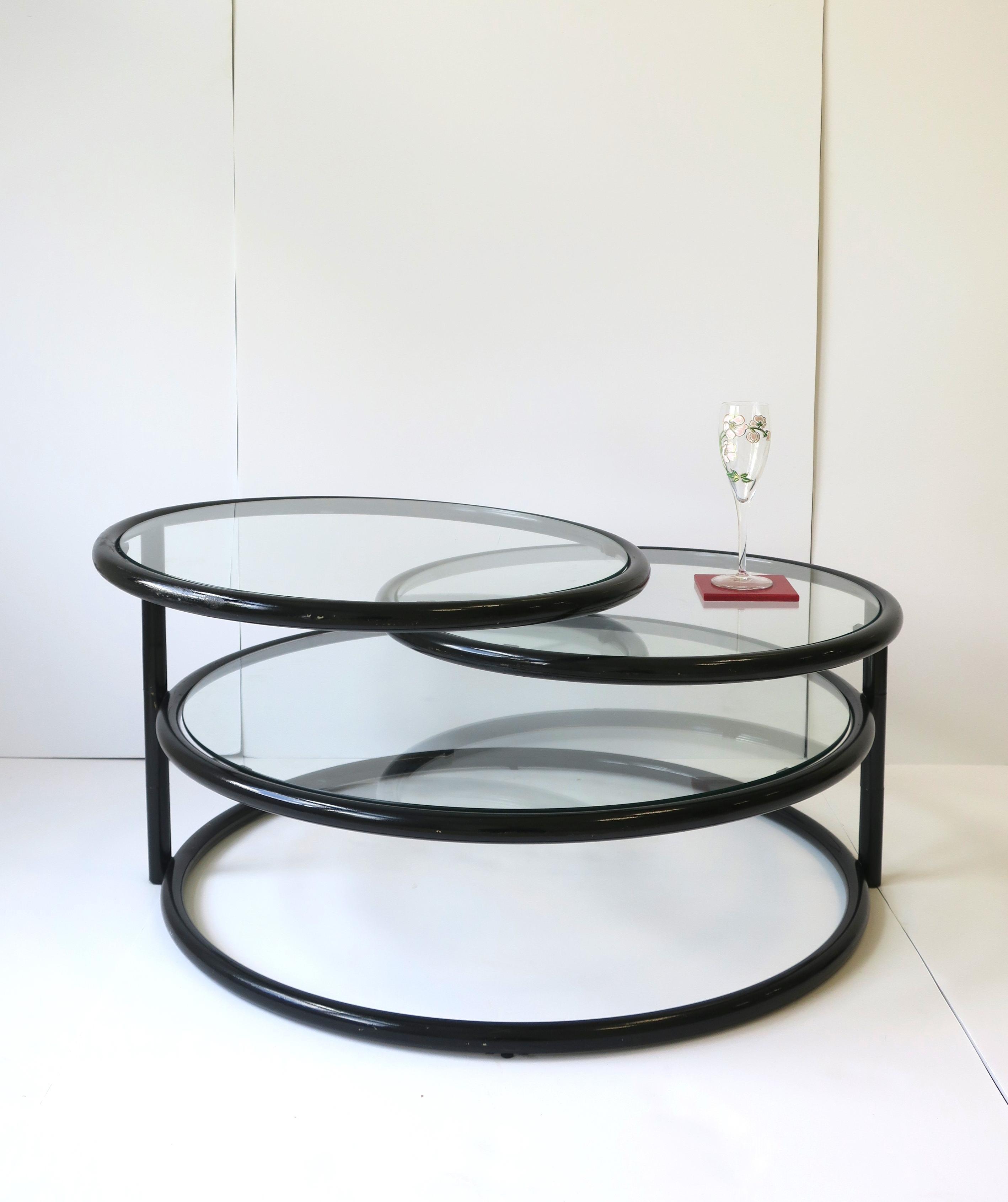 Metal Black Tubular and Glass Swivel Cocktail Coffee Table in the Milo Baughman Style For Sale