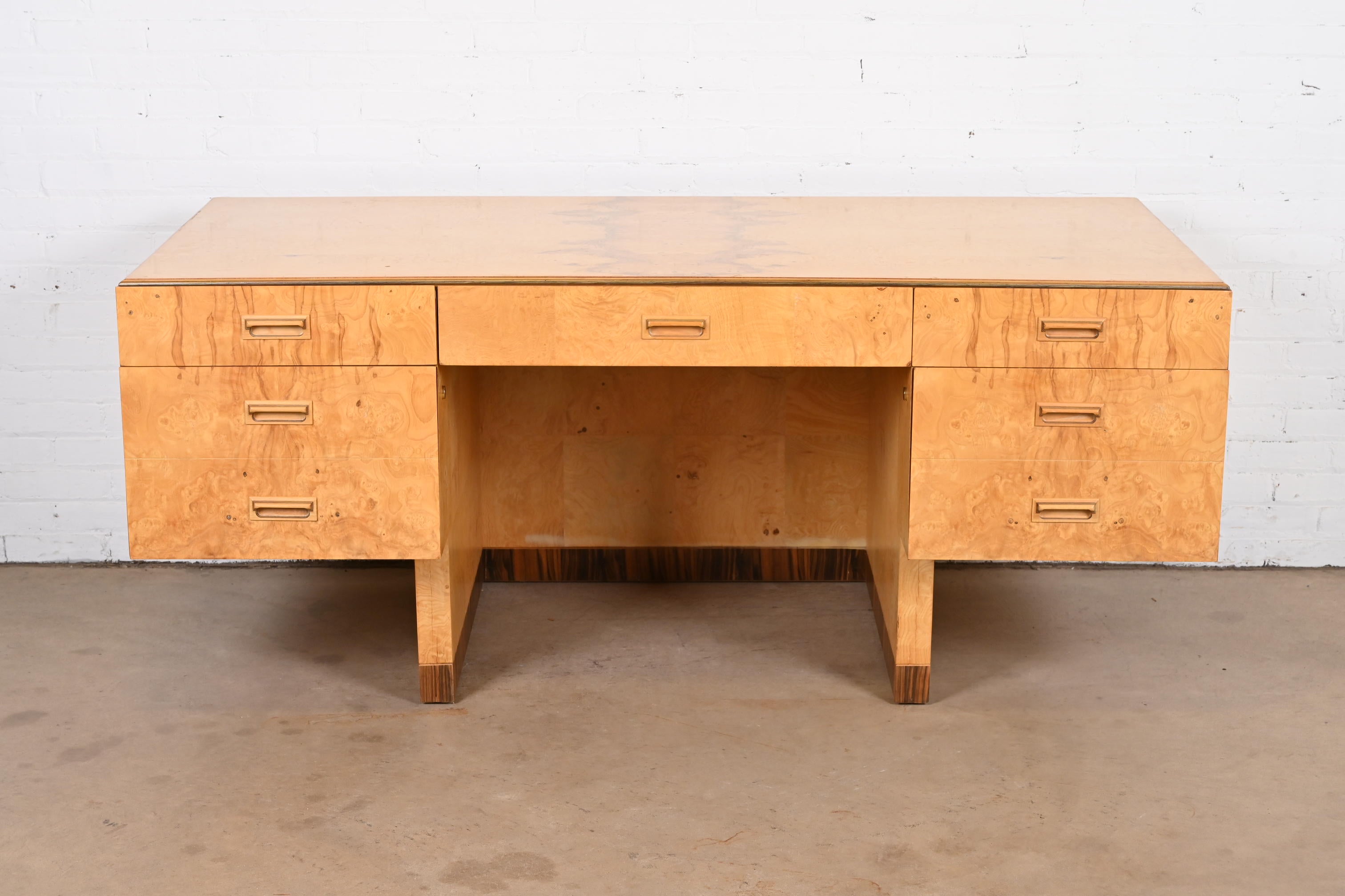 An exceptional Mid-Century Modern or Art Deco style executive writing desk

In the manner of Milo Baughman

By Henredon, 