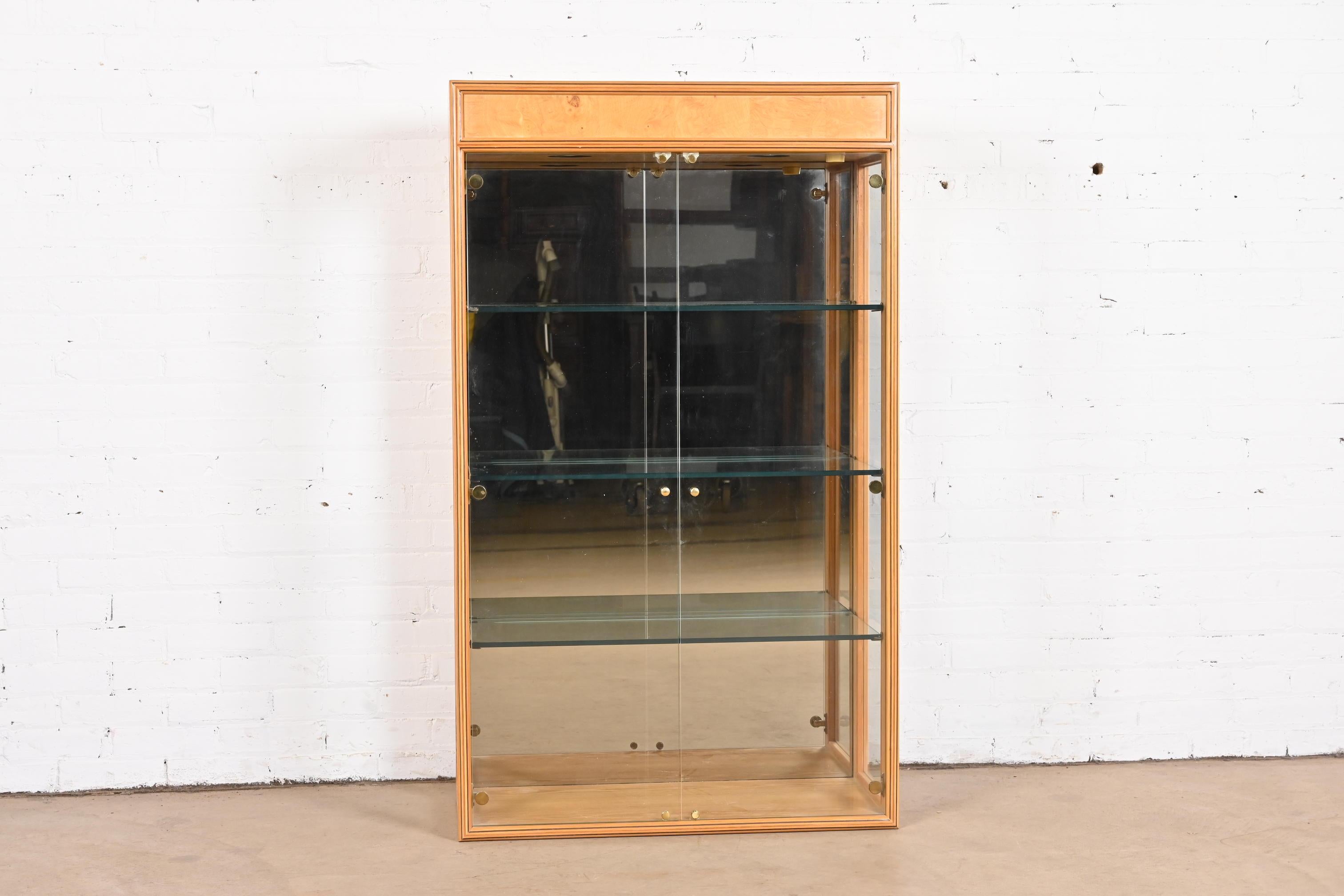 A gorgeous Milo Baughman style lighted display cabinet or bookcase with glass front doors

By Henredon, 