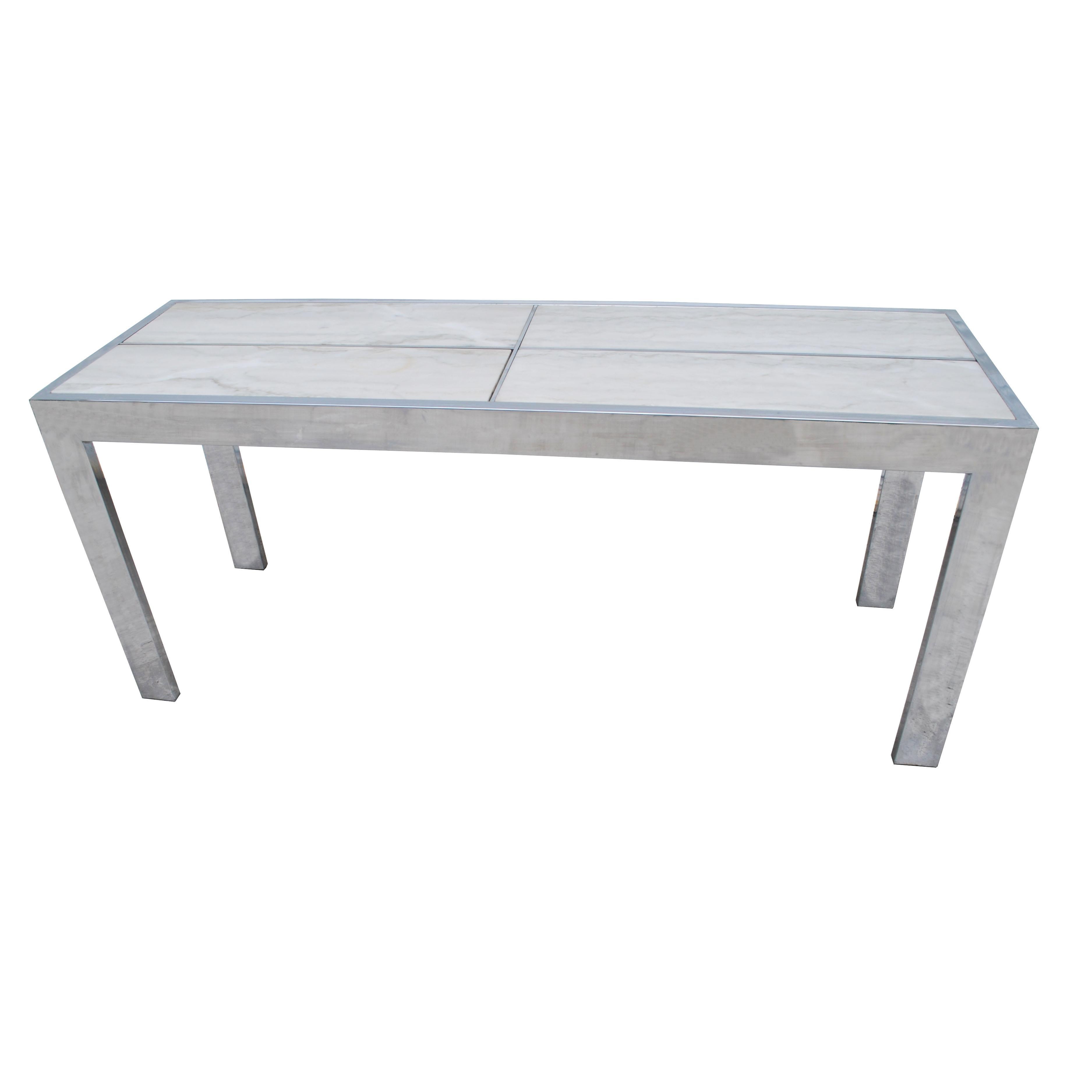 6-foot midcentury Baughman style console table with a chrome frame and Carrara marble inlays.

 
