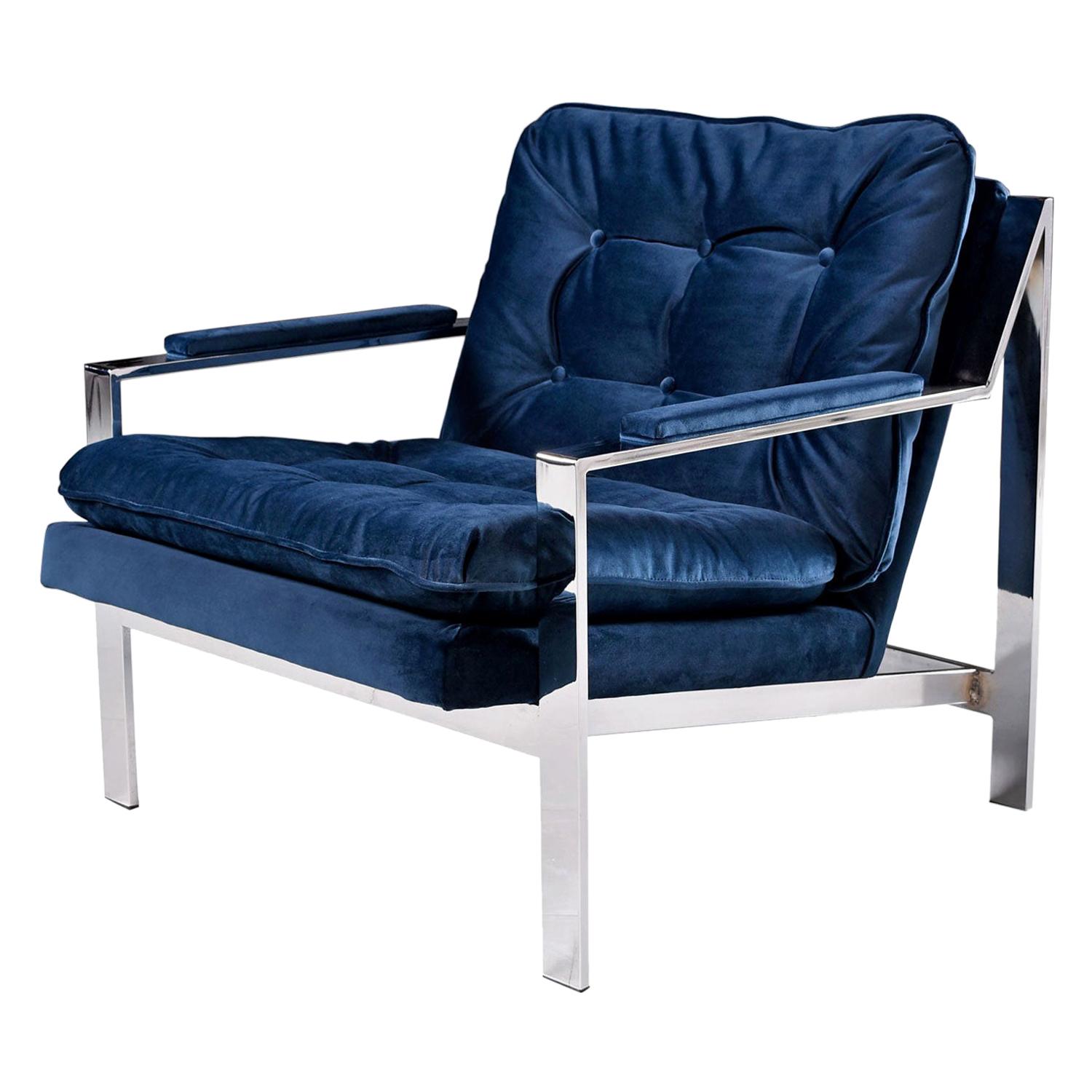 Restored, vintage flat bar chrome lounge chair designed by Cy Mann for Cy Mann Designs Ltd in the style of Milo Baughman. The lounge chair has been updated with luxurious, buttery soft navy blue / midnight blue velvet fabric by our in-house