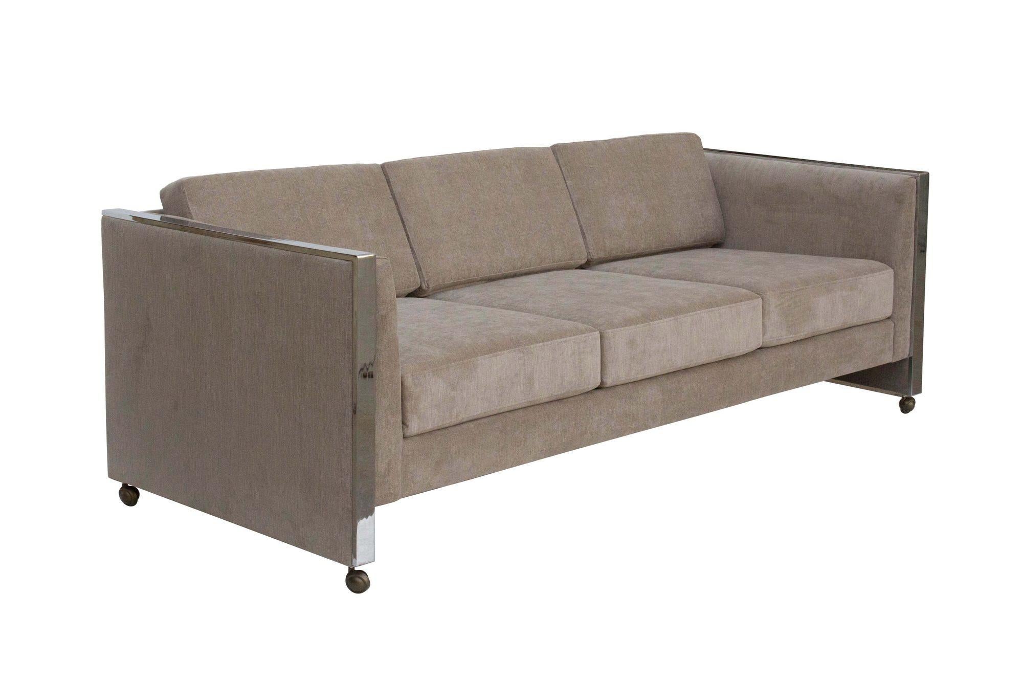 USA, 1970s
Milo Baughman- style mid-century modern made by Selig of Monroe. Newly reupholstered in a soft, low pile taupe velvet that looks very luxurious coupled with the chrome. Polished flat bar chrome lines the cleanly styled frame. Chrome is in