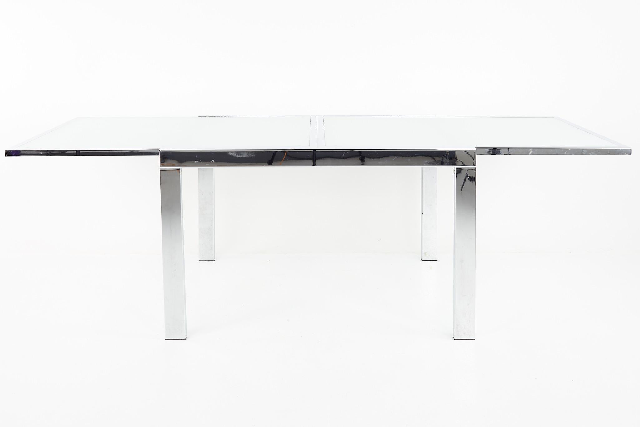 Milo Baughman Style for DIA mid century glass and chrome extendable dining table

This table measures: 47.25 wide x 35.25 deep x 29 inches high, with a chair clearance of 25 inches

All pieces of furniture can be had in what we call restored