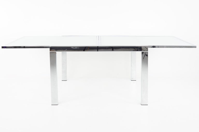 Milo Baughman Style for DIA mid century glass and chrome extendable dining table

This table measures: 47.25 wide x 35.25 deep x 29 inches high, with a chair clearance of 25 inches

All pieces of furniture can be had in what we call restored