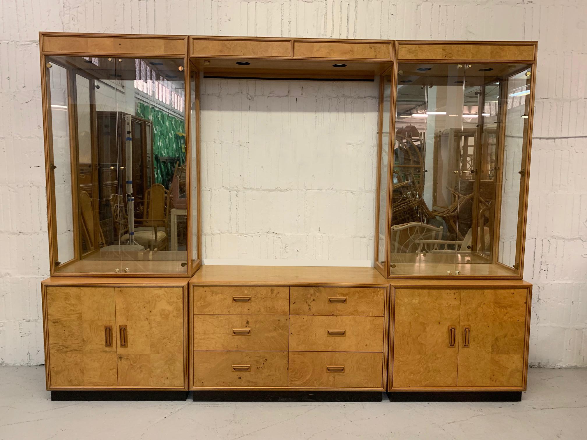 Large Milo Baughman style mid-century modern 6-piece wall unit features patch work burl wood construction, mirrored display cases with glass shelves, and hand inlaid door pulls. From the Henredon 