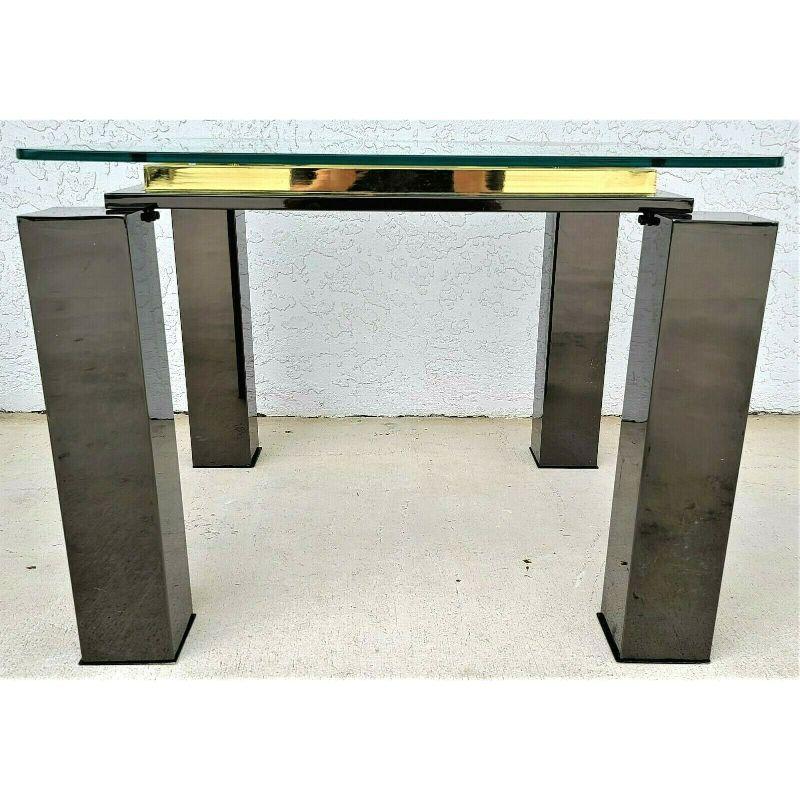 For FULL item description click on CONTINUE READING at the bottom of this page.

Offering One Of Our Recent Palm Beach Estate Fine Furniture Acquisitions Of A 
MCM Milo Baughman Style Italian Black Chrome Brass Glass Coffee Side End Table
Made