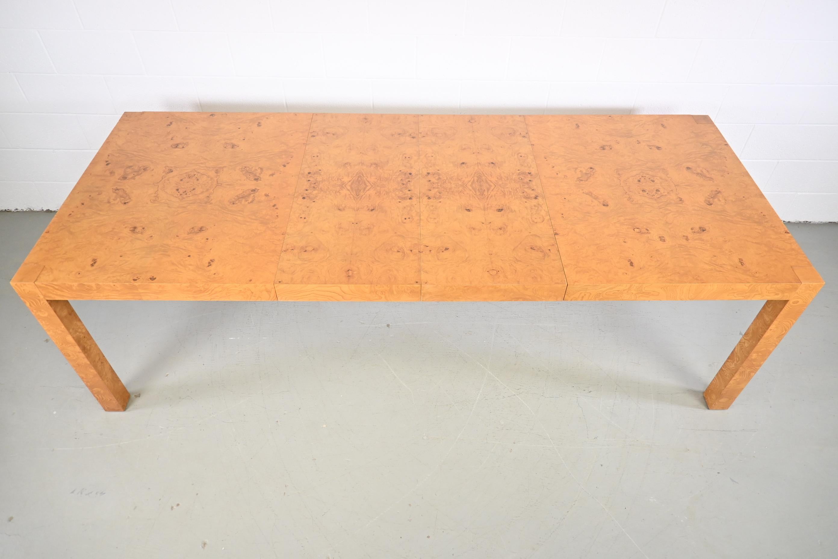 Lane Furniture Burl Parsons extension dining table in the style of Milo Baughman

Lane Furniture, USA, 1970s

Measures: 64 Wide x 40 Deep x 30 High. Extends up to 100