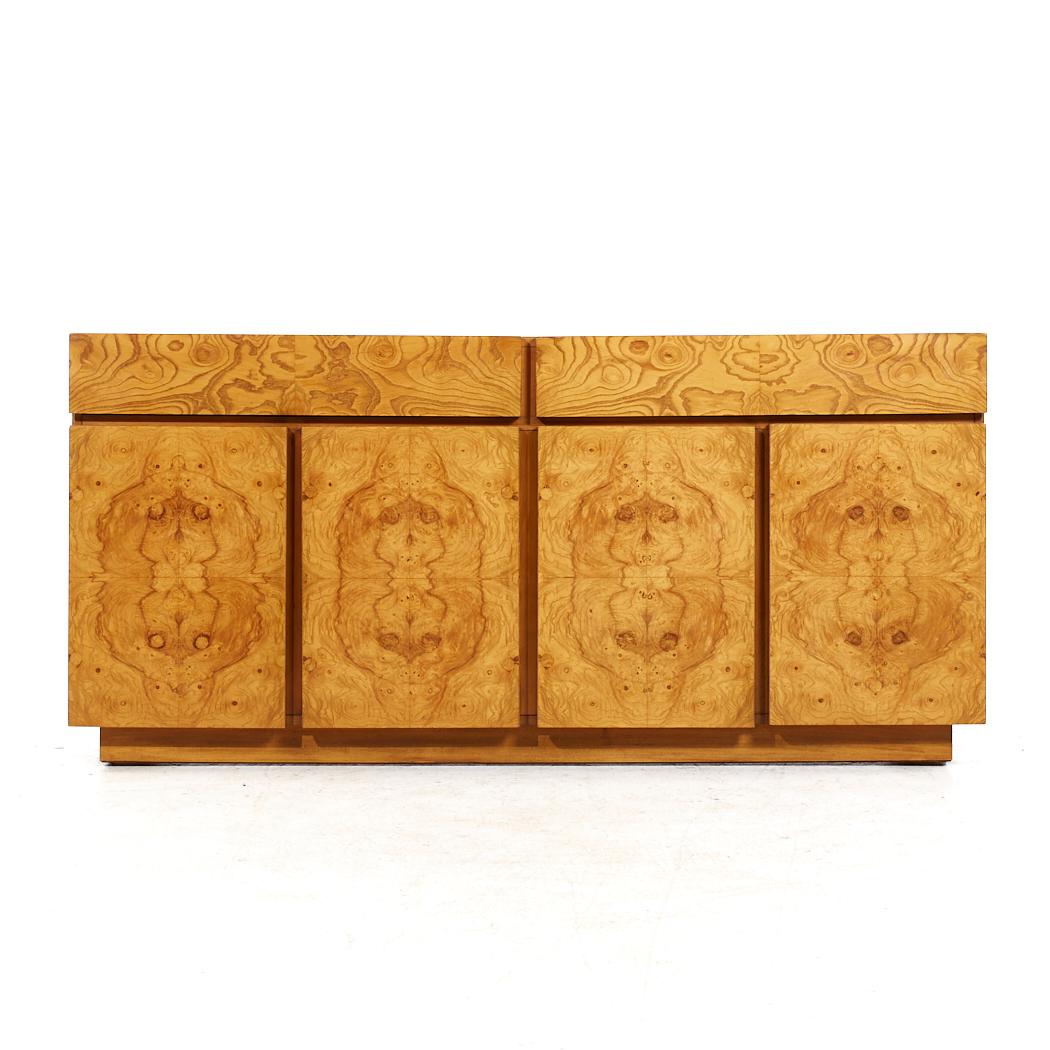 Milo Baughman Style Lane Mid Century Burlwood Credenza

This credenza measures: 67.75 wide x 18 deep x 32 inches high

All pieces of furniture can be had in what we call restored vintage condition. That means the piece is restored upon purchase so