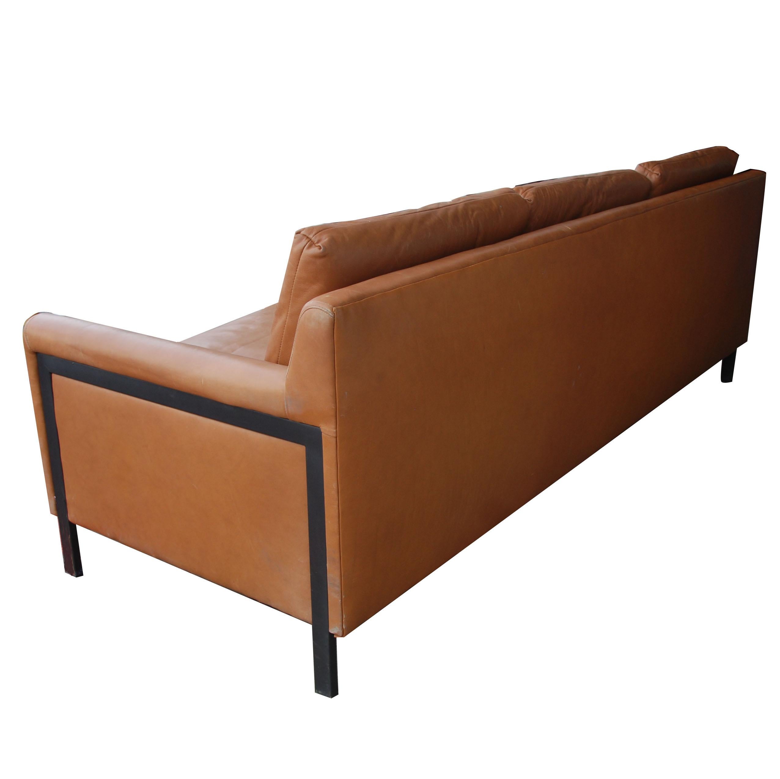 Milo Baughman style leather sofa

Caramel leather with a bronze-plated metal frame. Nicely aged leather.
 