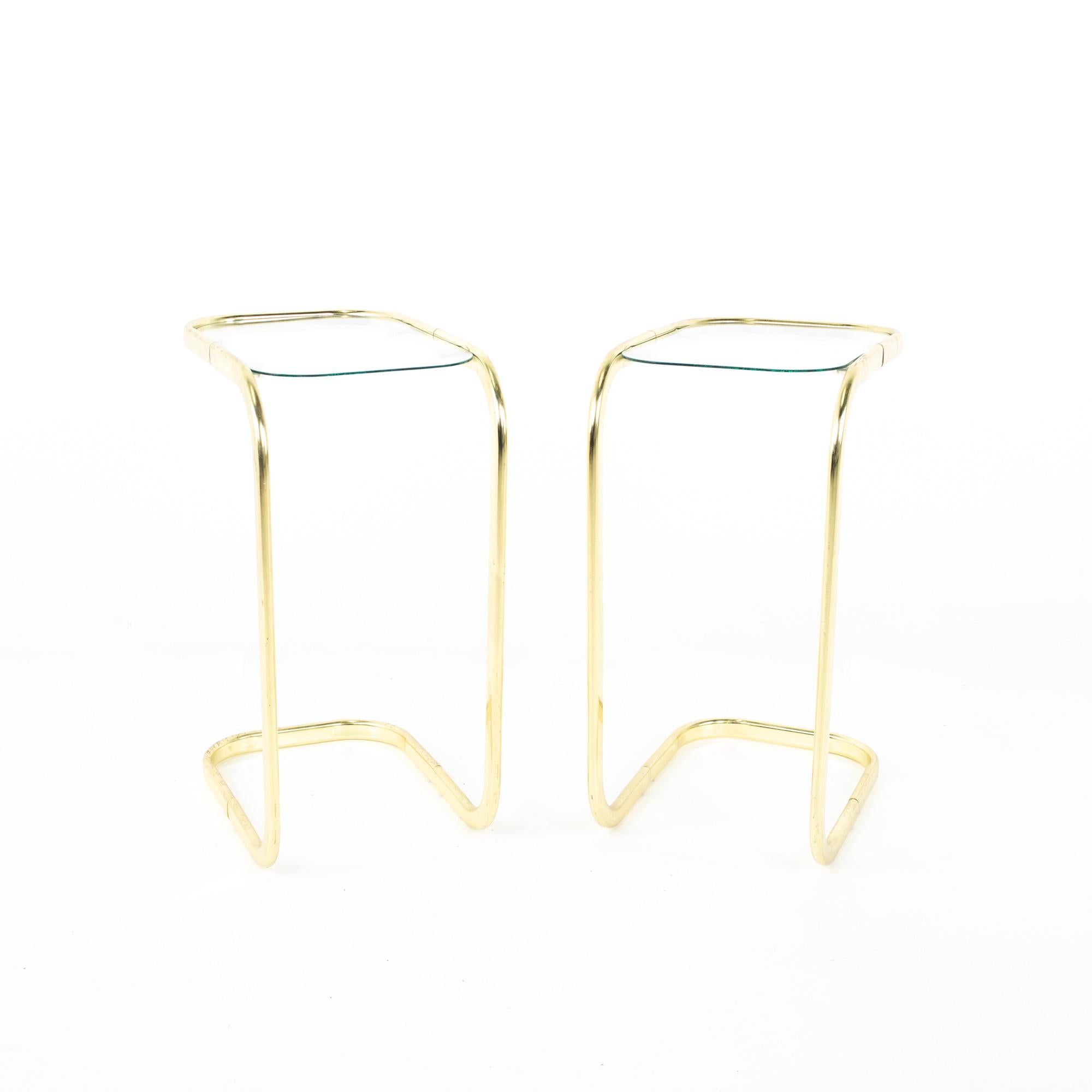 Milo Baughman style brass and glass cantilever side end tables - pair
End table measures: 9.5 wide x 14 deep x 20.5 inches high

All pieces of furniture can be had in what we call restored vintage condition. That means the piece is restored upon