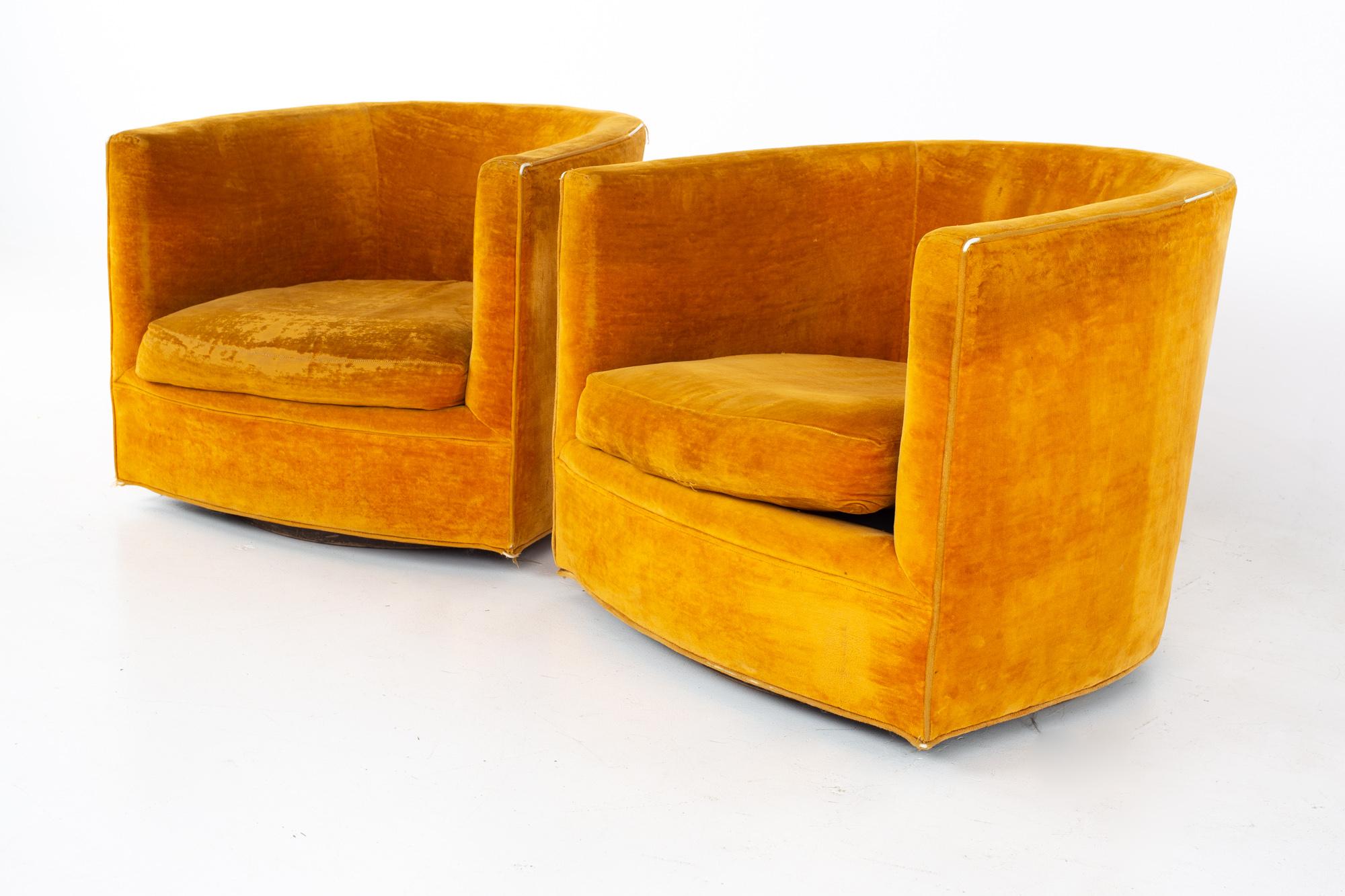 Milo Baughman style mid century barrel swivel lounge chairs - a pair.
Each chair measures: 28.5 wide x 31 deep x 24.5 high, with a seat height of 13.5 inches 
Ready for new upholstery

All pieces of furniture can be had in what we call restored