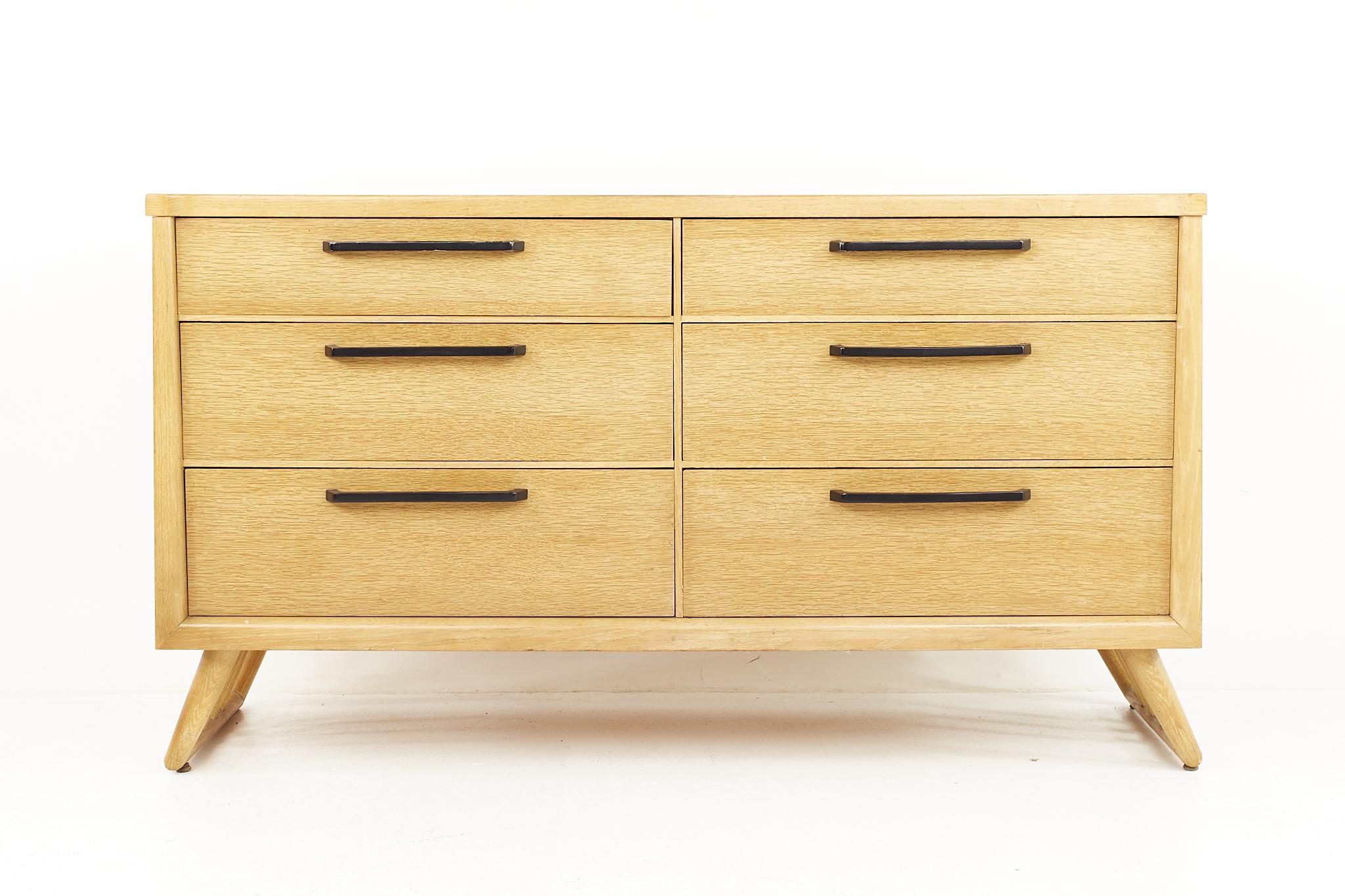Milo Baughman style mid century blonde 6 drawer lowboy dresser

The dresser measures: 58 wide x 20 deep x 32.25 inches high 

All pieces of furniture can be had in what we call restored vintage condition. That means the piece is restored upon