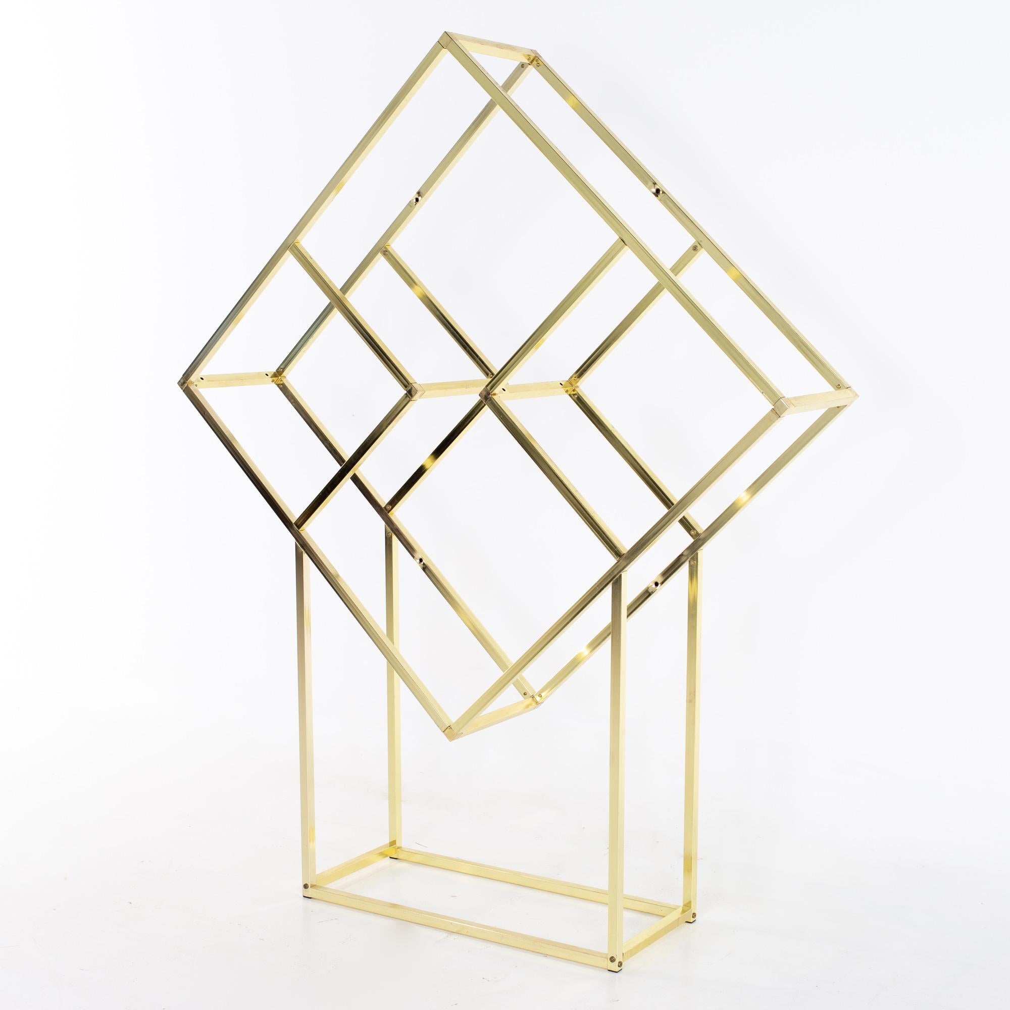 Milo Baughman style mid century brass and glass diamond étagère
Etagere measures: 52 wide x 12 deep x 64.5 inches high

All pieces of furniture can be had in what we call restored vintage condition. That means the piece is restored upon purchase