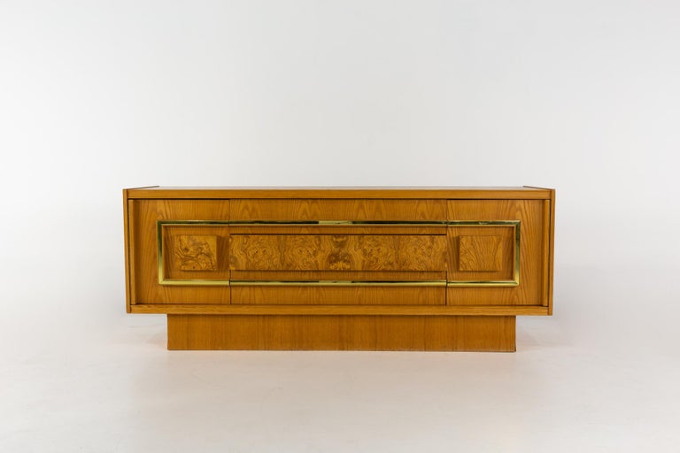 Milo Baughman Style Mid Century burlwood and brass credenza

This credenza measures: 75 wide x 20 deep x 29 inches high

All pieces of furniture can be had in what we call restored vintage condition. That means the piece is restored upon