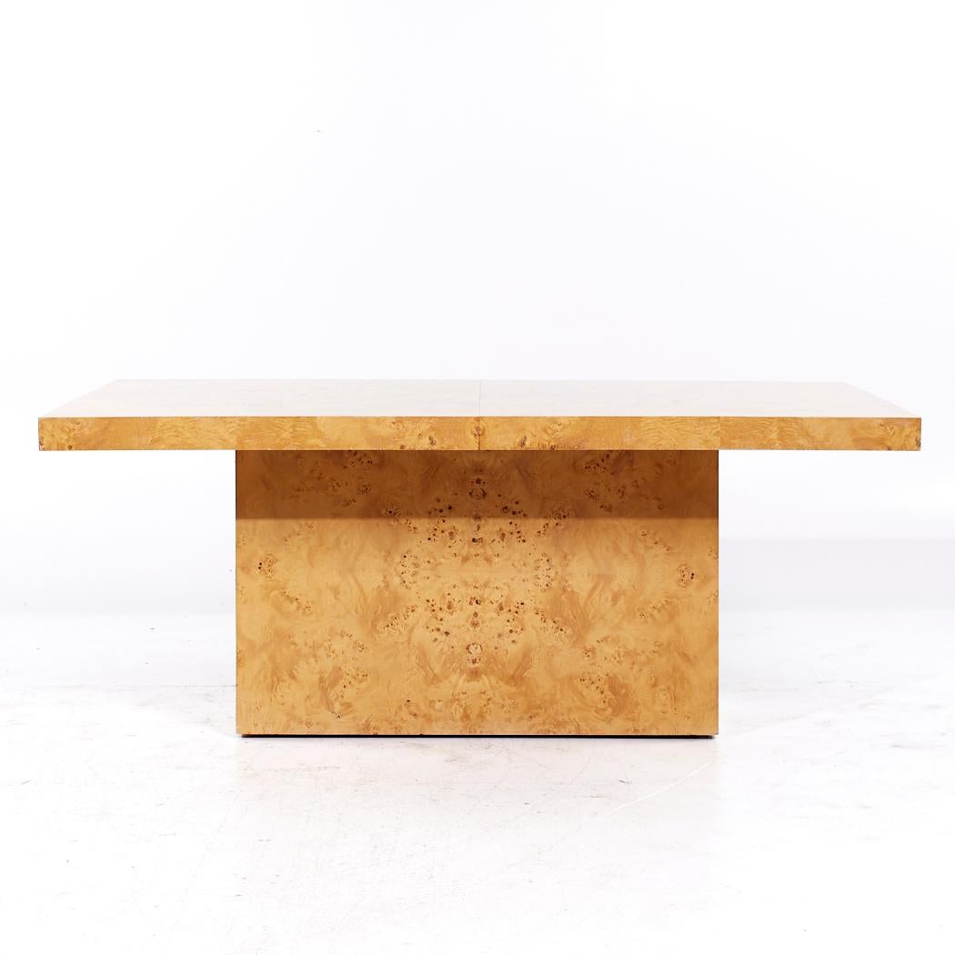 Milo Baughman Style Mid Century Burlwood Hidden Leaf Expanding Dining Table with 2 Leaves

This table measures: 71.75 wide x 38 deep x 29.25 inches high, with a chair clearance of 26.5 inches, each hidden leaf measures 17.75 inches wide, making a