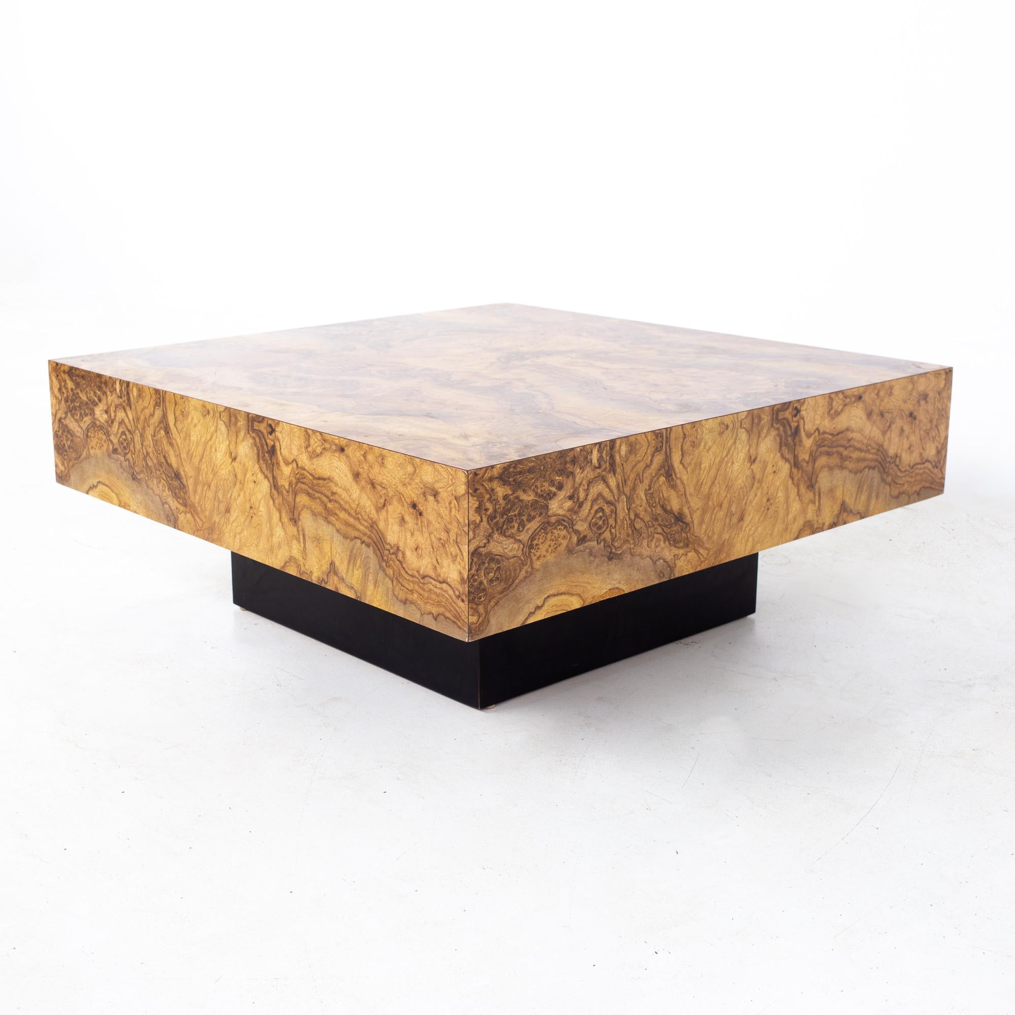 Milo Baughman style mid century burlwood laminate pedestal coffee table
Table measures: 36 wide x 36 deep x 14.5 inches high

All pieces of furniture can be had in what we call restored vintage condition. That means the piece is restored upon