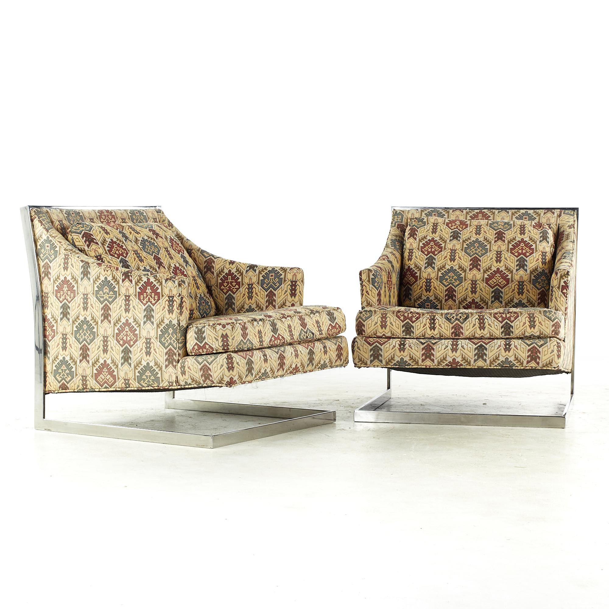 Milo Baughman style midcentury chrome cantilever lounge chairs - pair

Each chair measures: 27.5 wide x 32 deep x 28.25 high, with a seat height of 15 and arm height/chair clearance 20 inches

All pieces of furniture can be had in what we call