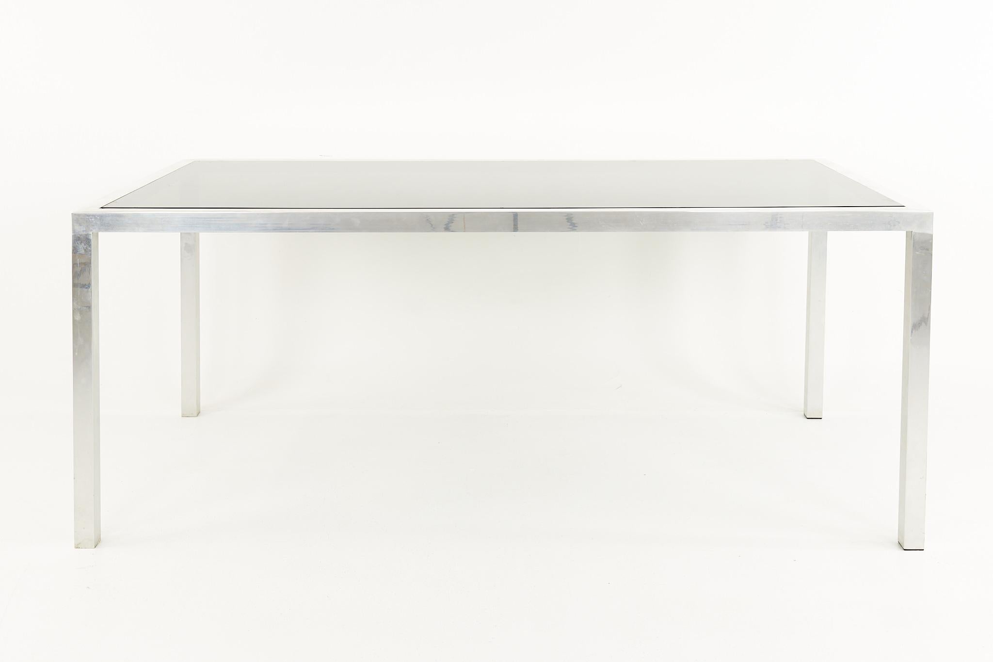 Milo Baughman Style Mid Century Chrome Expanding dining table

The table measures: 72 wide x 36 deep x 29.25 high, with a chair clearance of 27.5 inches high 

All pieces of furniture can be had in what we call restored vintage condition. That