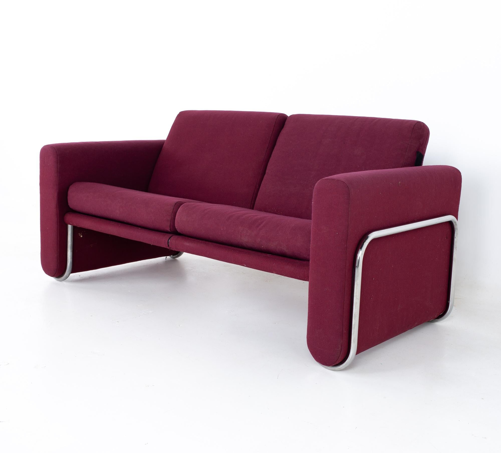 Milo Baughman style mid century cranberry purple and chrome loveseat setee sofa.
Sofa measures: 60.5 wide x 31 deep x 31.25 high, with a seat height of 17.5 inches 

All pieces of furniture can be had in what we call restored vintage condition.