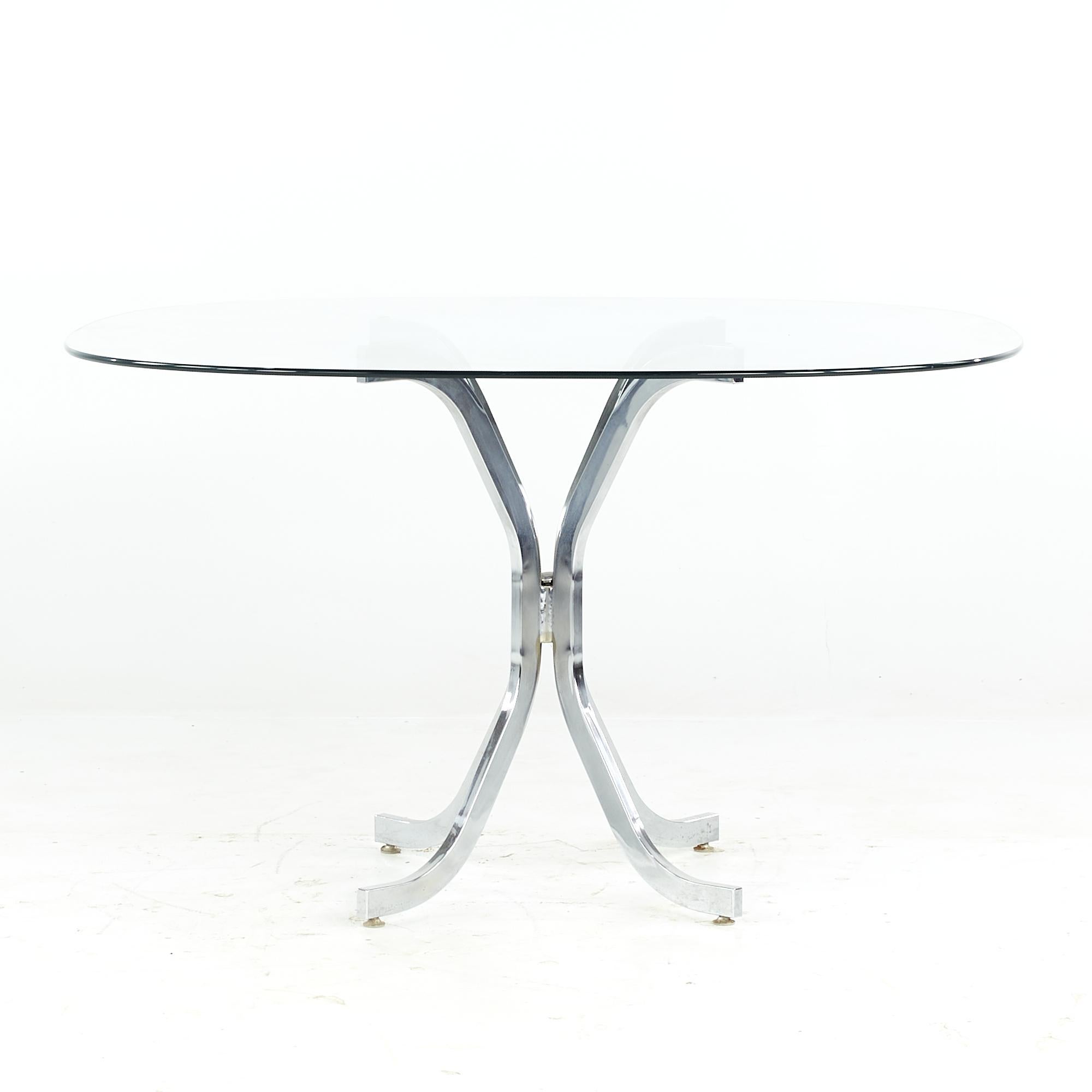 Milo Baughman Style midcentury Glass and Chrome Dining Room Table

This dining table measures: 48 wide x 48 deep x 29.25 high, with a chair clearance of 28.75 inches

All pieces of furniture can be had in what we call restored vintage condition.