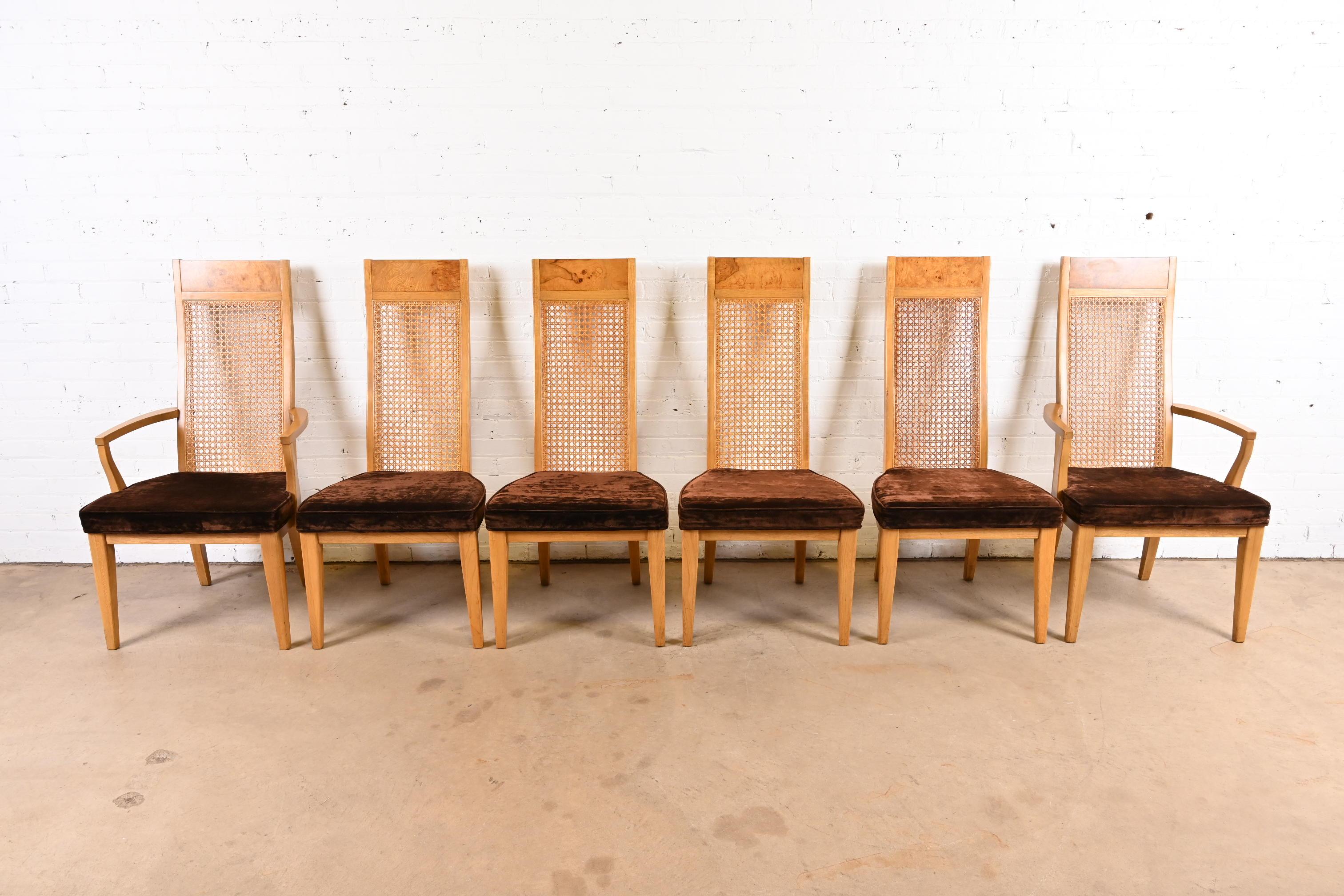 A gorgeous set of six Milo Baughman style Mid-Century Modern dining chairs

By Lane Furniture

USA, 1970s

Ash and burl wood frames, with caned backs and brown velvet upholstered seats.

Measures:
Side chairs - 21