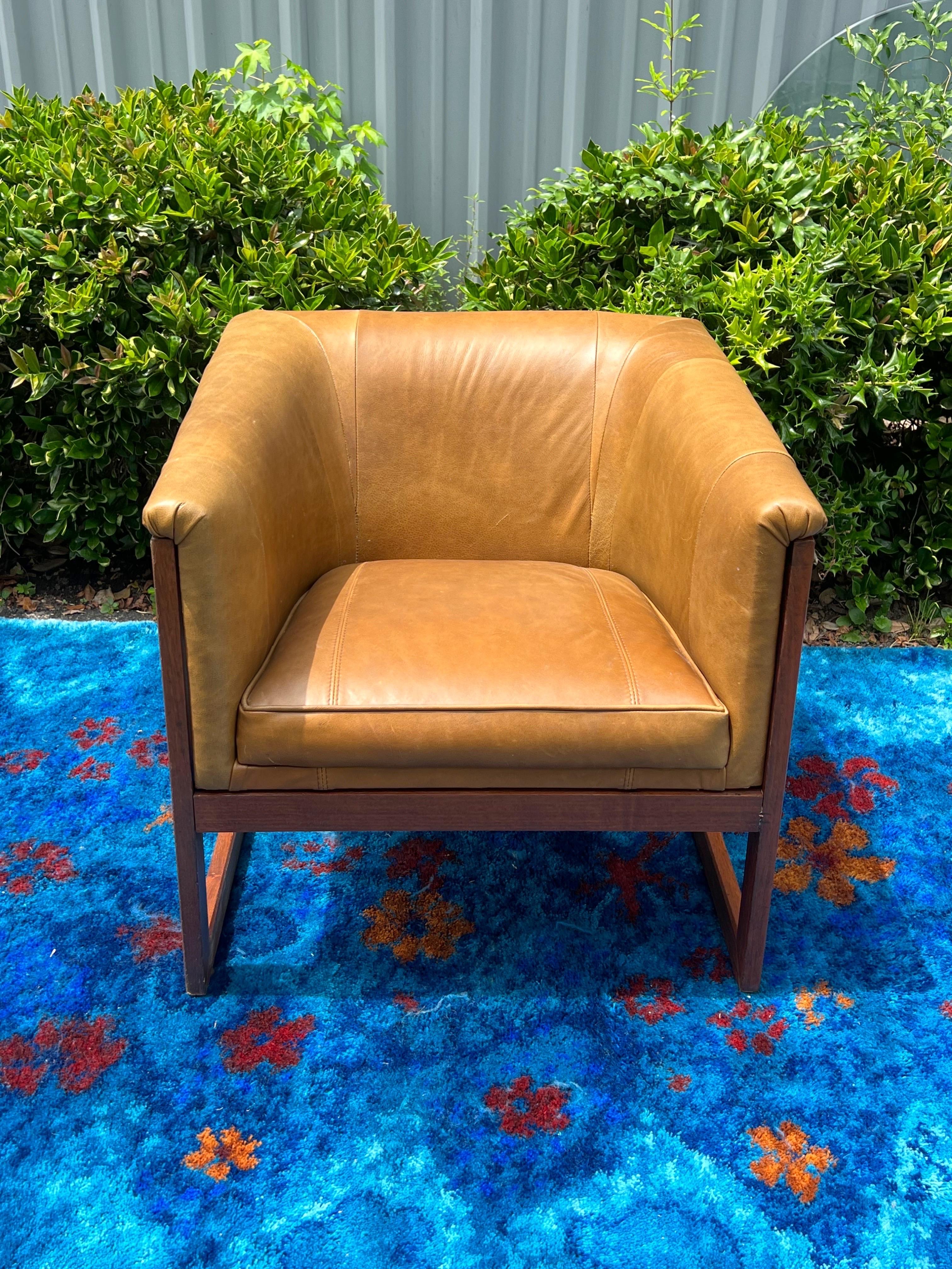 Newly upholstered in a buttery cognac vintage leather.  These chairs were not marked, so that’s why I must put “Milo Baughman Style”.   This chair has a sleek frame and the pitch makes the chair super comfortable.