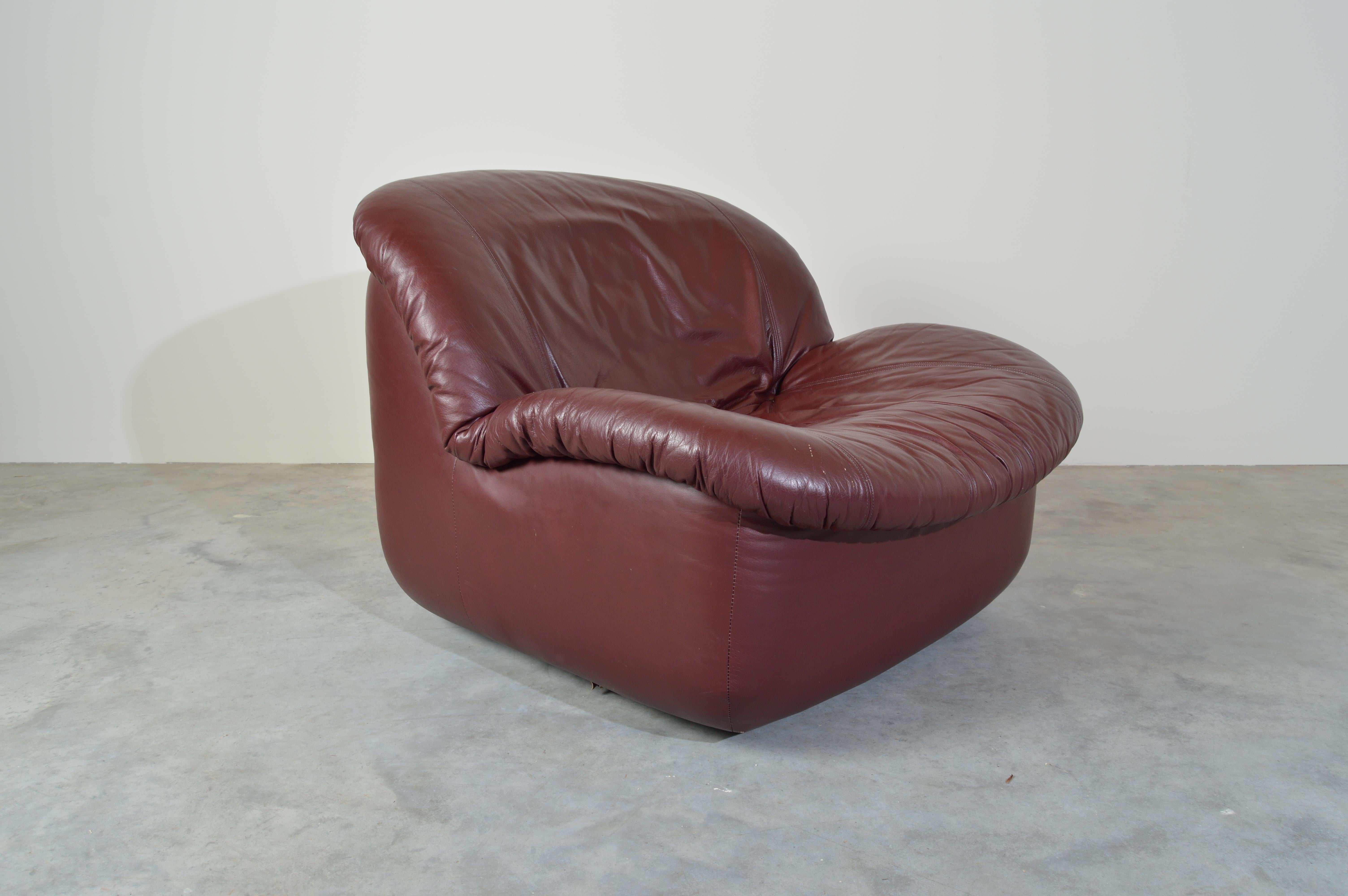 Late 20th Century Milo Baughman Style Oxblood Swivel Lounge Chair by Burris