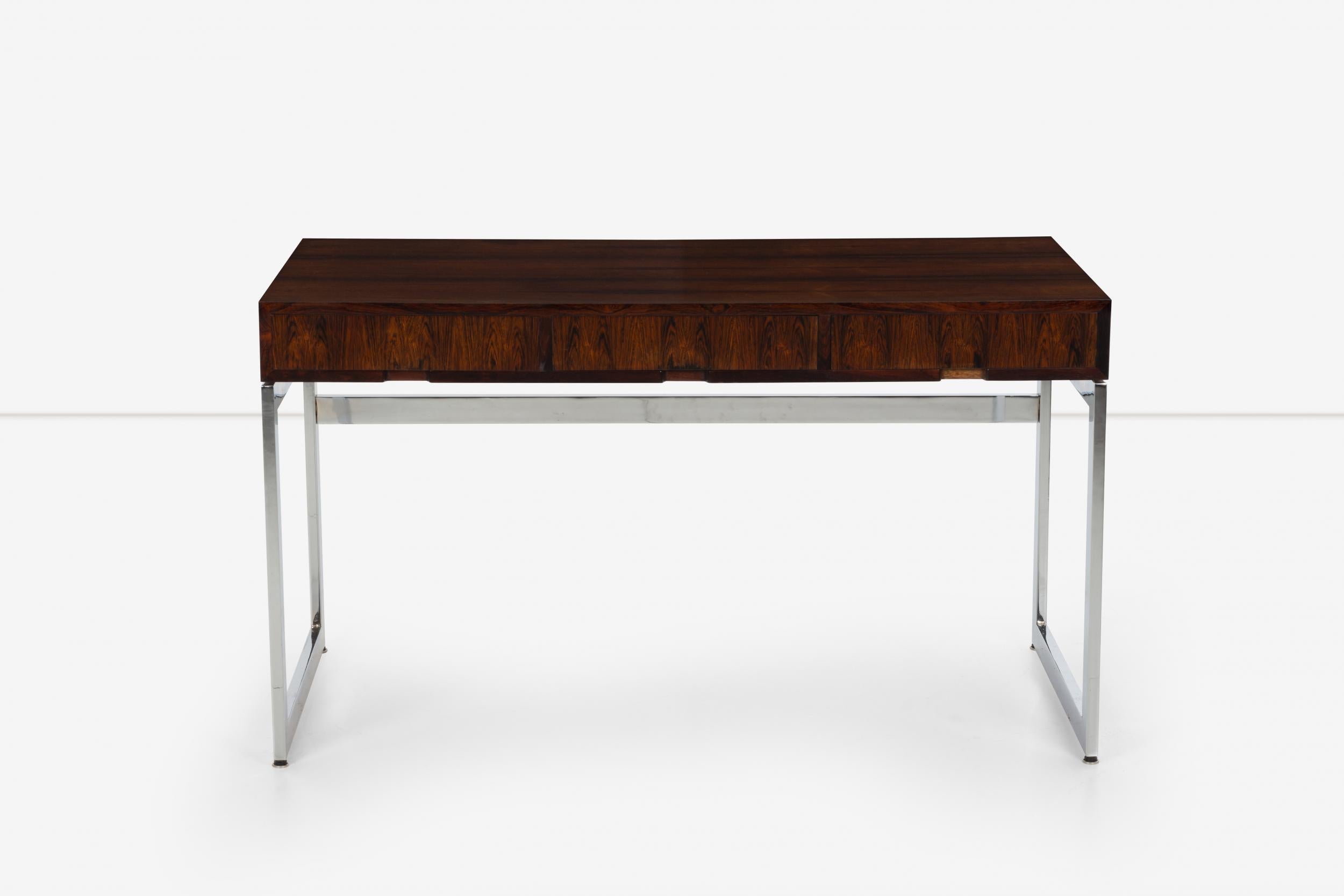 Milo Baughman style three-drawer rosewood desk, with chrome base.