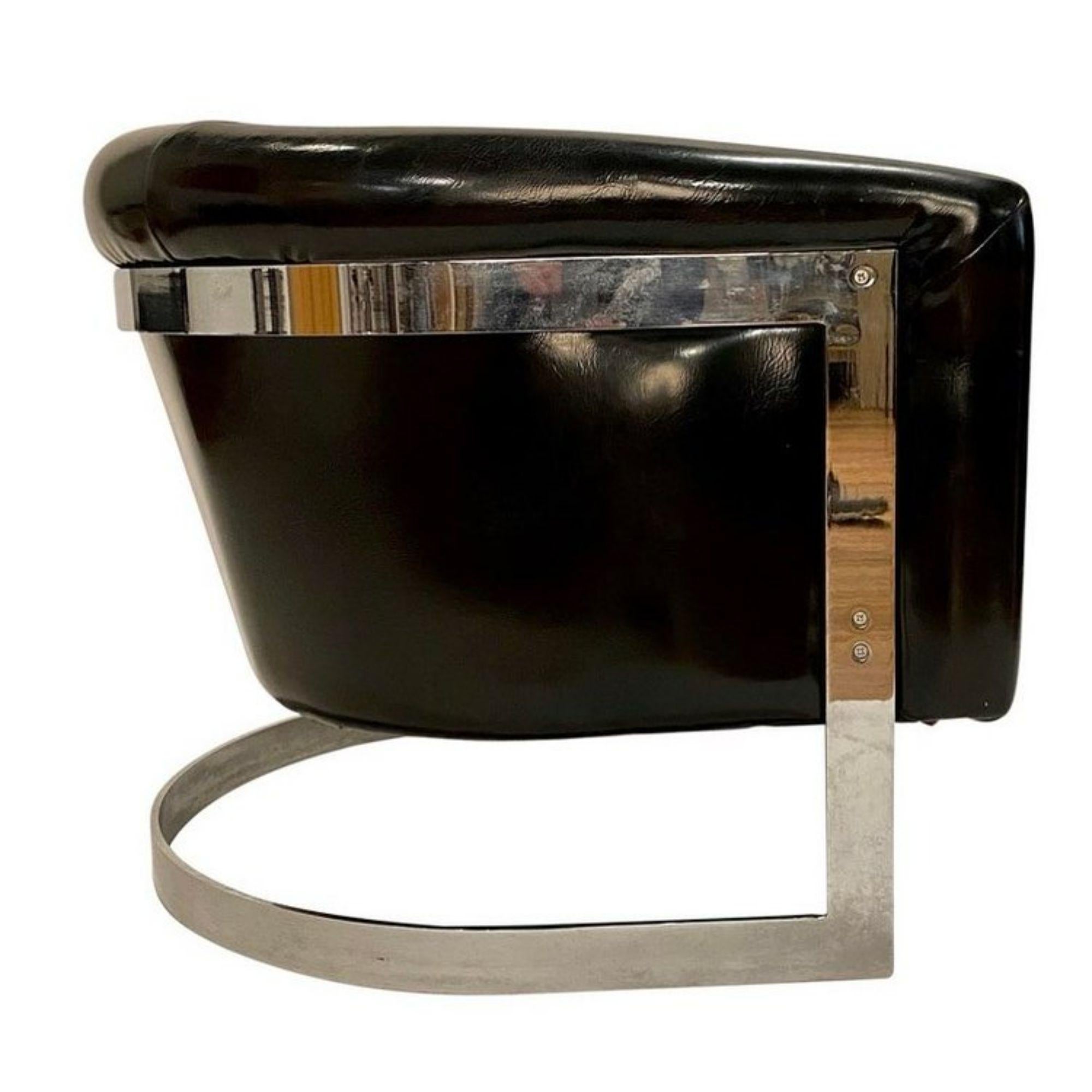Mid-Century Modern Milo Baughman style tub or barrel chair on a polished chrome steel frame in vintage patent black vinyl upholstery. See our listings for similar chairs and sofa in this style.

Additional Information:
Materials: vinyl, polished