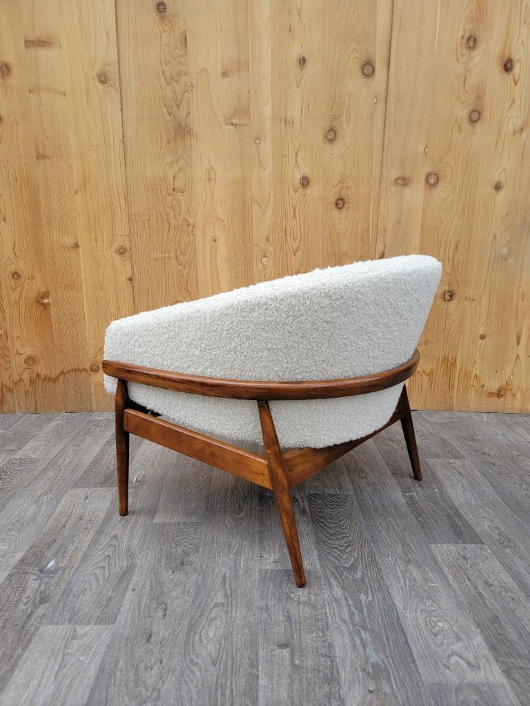 Mid Century Modern Milo Baughman Style Walnut Barrel Back Lounge Chair Newly Upholstered in a Natural Boucle

This is a beautiful mid century modern low profile chair with a rounded wood walnut frame. This design is attributed to Milo Baughman, also