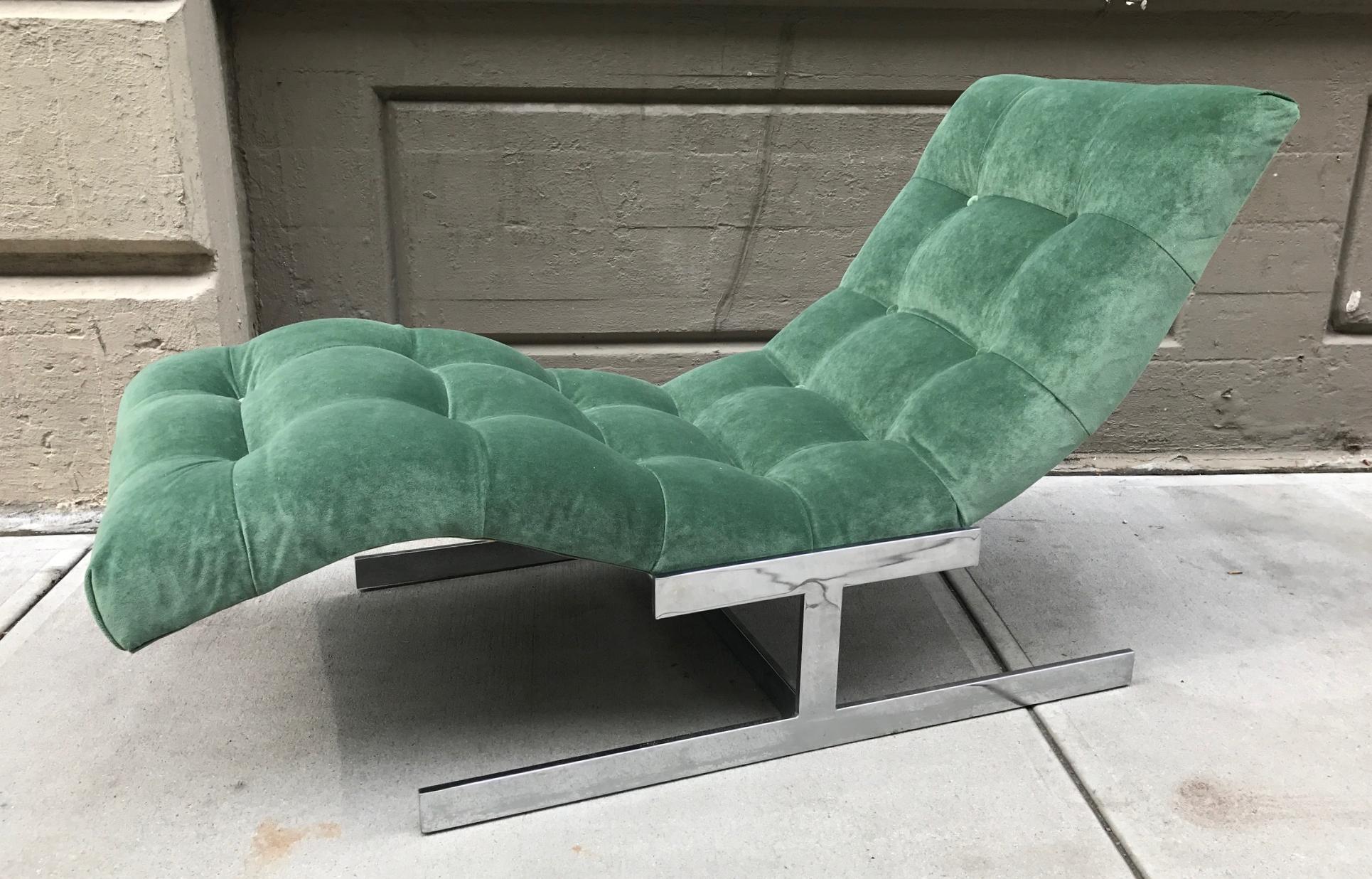 Milo Baughman style wave chaise lounge with polished chrome pedestal base. Newly upholstered in tufted green velvet.
