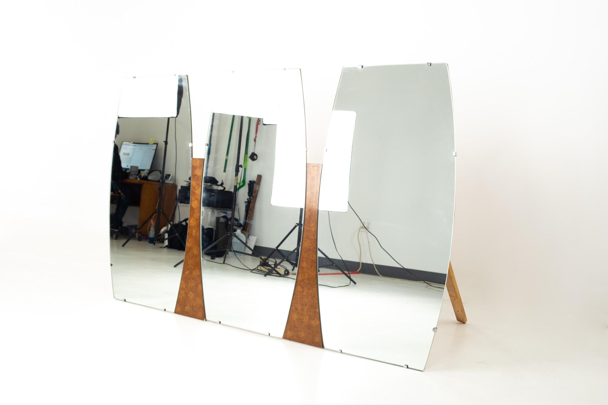 Milo Baughman Style Young Manufacturing Mid Century Walnut and Burlwood Mirror
Mirror measures: 64.5 wide x 2 deep x 40.5 inches high

All pieces of furniture can be had in what we call restored vintage condition. That means the piece is restored