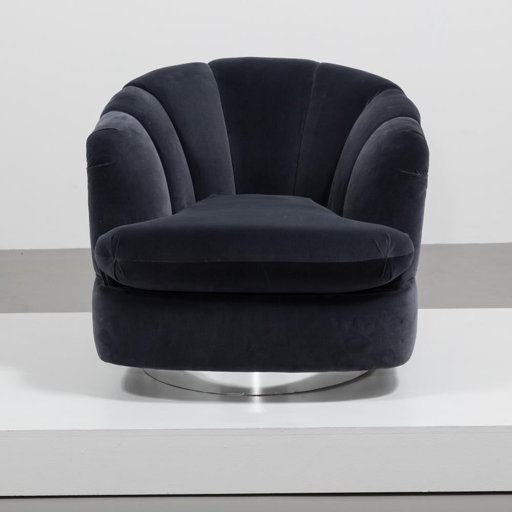 A single quilted back charcoal velvet chair on a steel swivel base, by Milo Baughman for Directional 1980s

Milo Baughman Design Inc was established in 1947. In 1948 he helped create the California Modern collection for Glenn of California which