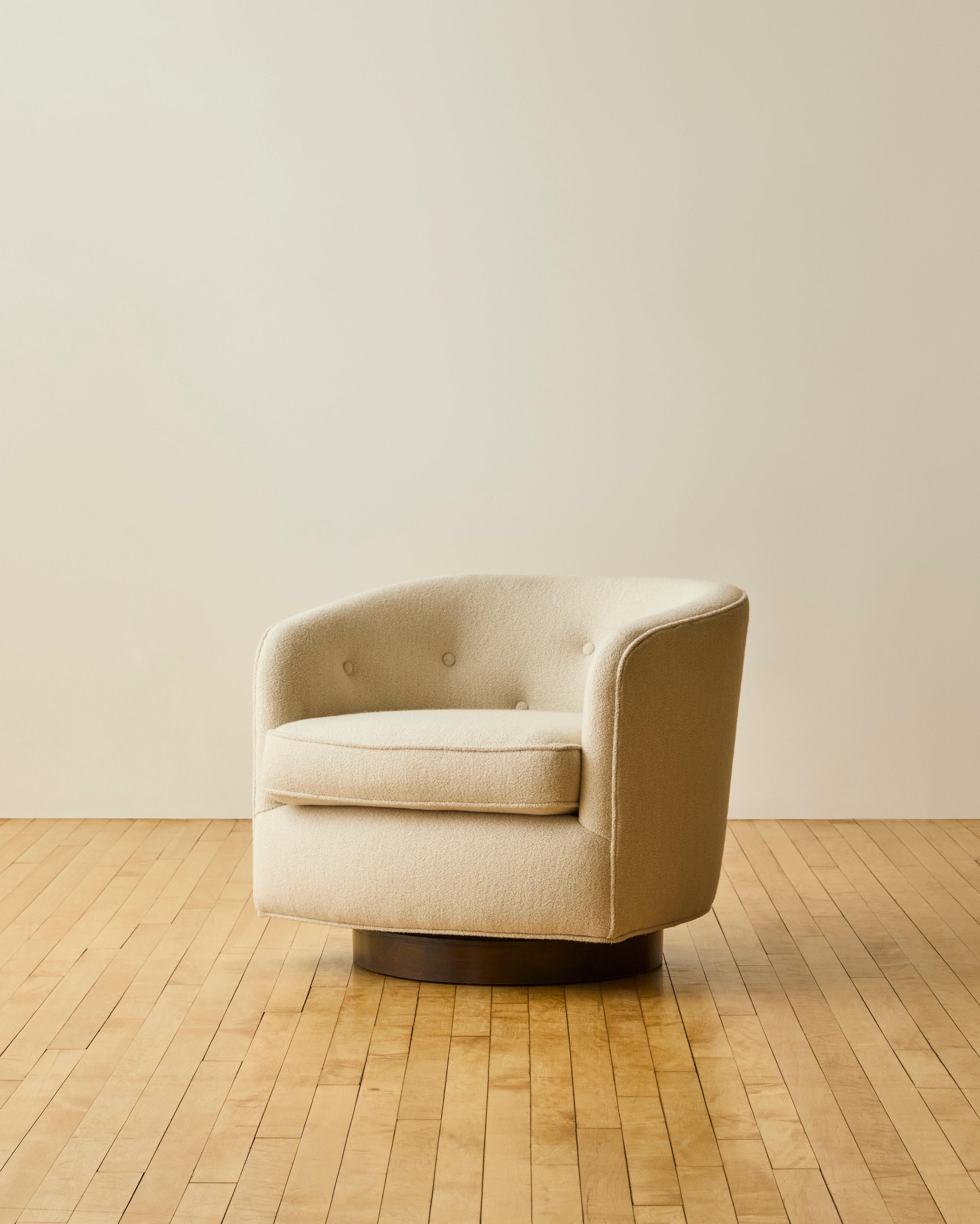 Milo Baughman swivel chair with wood base that has been newly reupholstered in Pierre Frey soft wool.