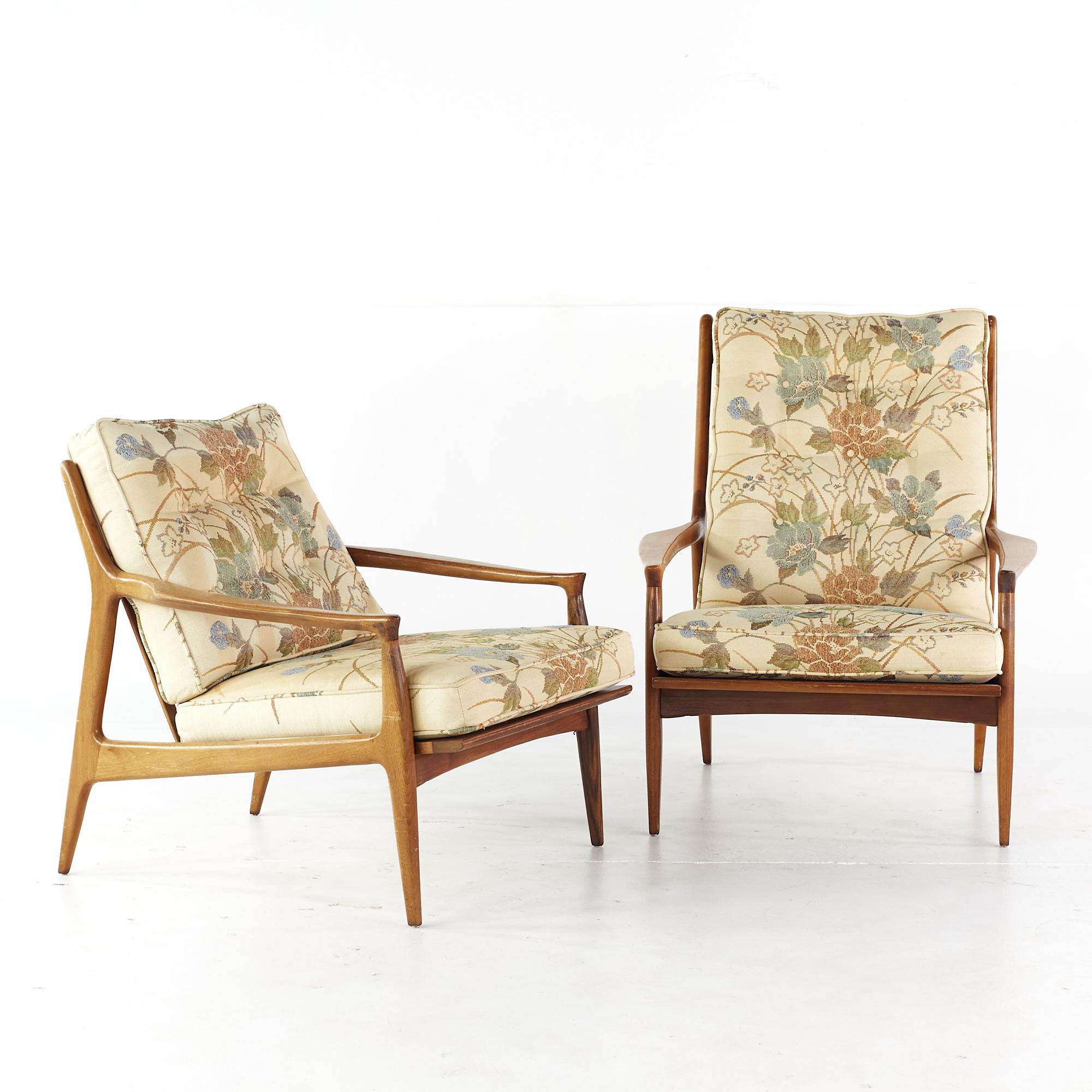 Milo Baughman for Thayer Coggin Mid Century His and Hers Archie Walnut Lounge Chairs - Pair

These chairs measure: 30 wide x 31 deep x 31 inches high with a seat height of 15.5 and an arm height/chair clearance of 19.5 inches

All pieces of