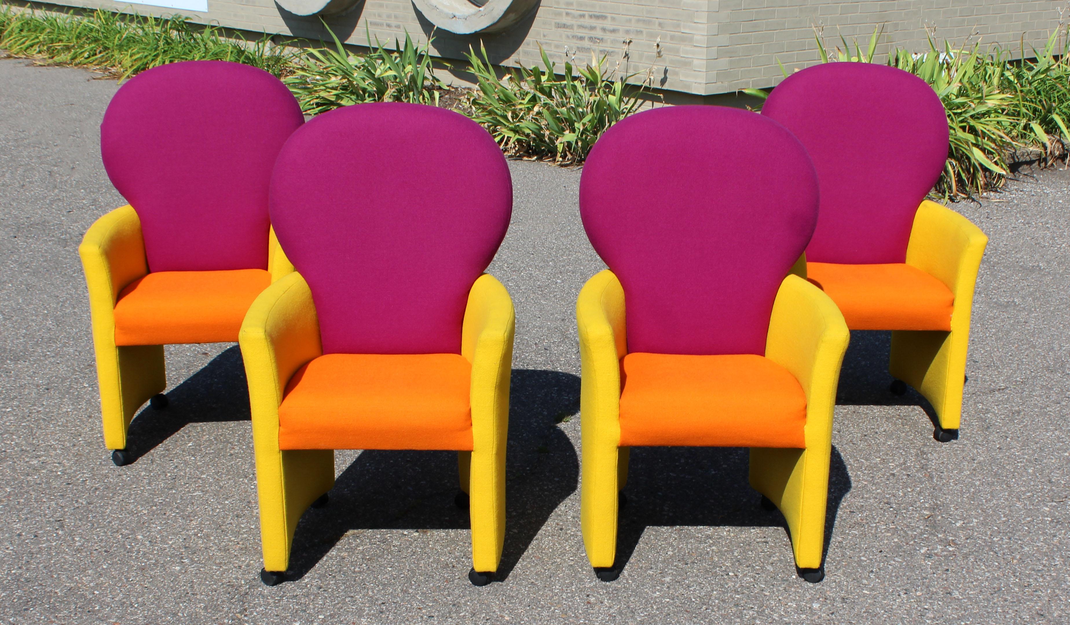 For your consideration is a phenomenal, set of four lounge armchairs, with purple backs, orange seats and yellow sides, by Milo Baughman for Thayer Coggin, circa 1970s. In excellent condition. The dimensions are 25