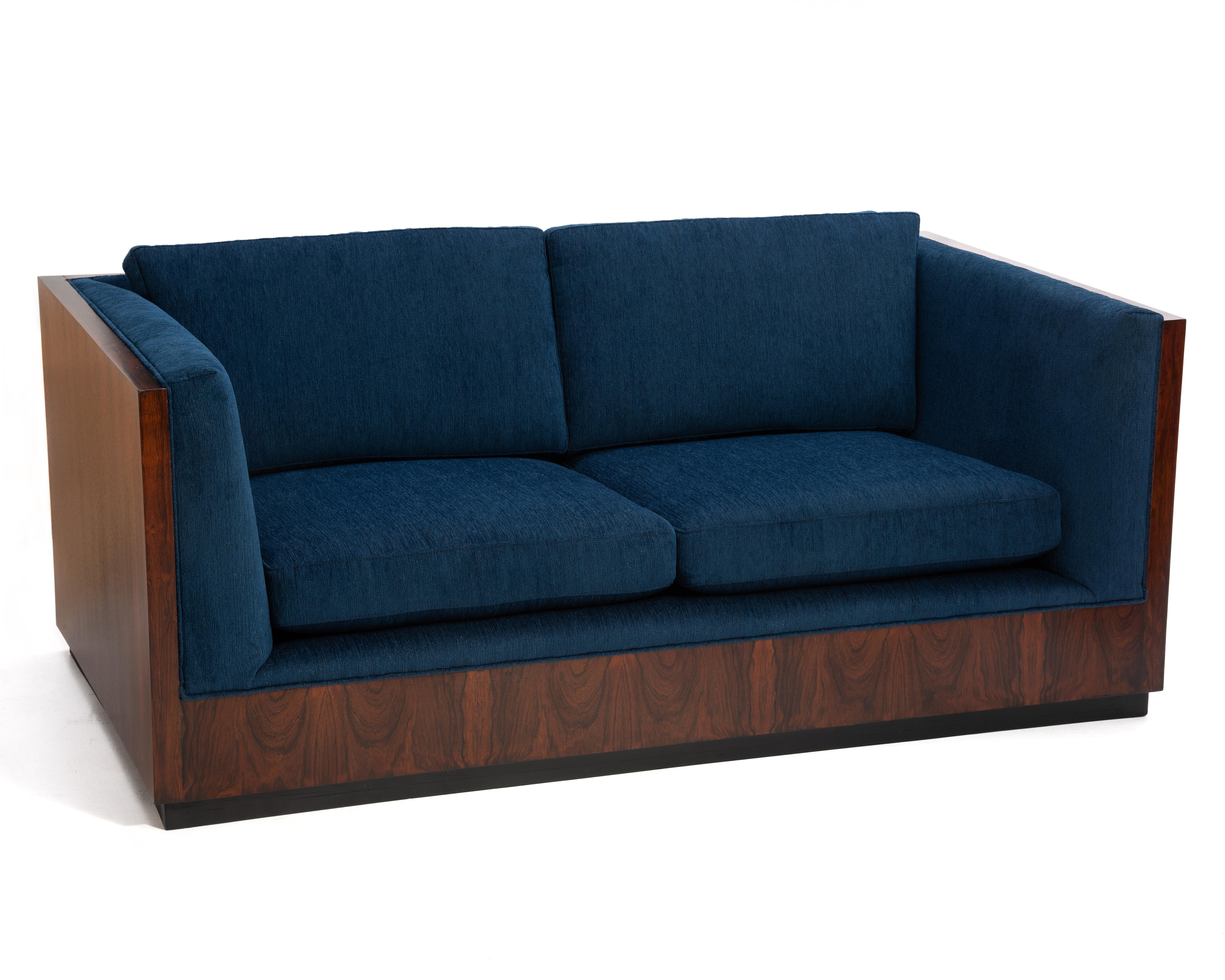 Fresh from the home of the original owner, a Milo Baughman for Thayer Coggin Rosewood Case Sofa, fully marked. Professionally restored, the rosewood was well chosen and has wonderful color, depth and clarity. Freshly reupholstered, the fabric is