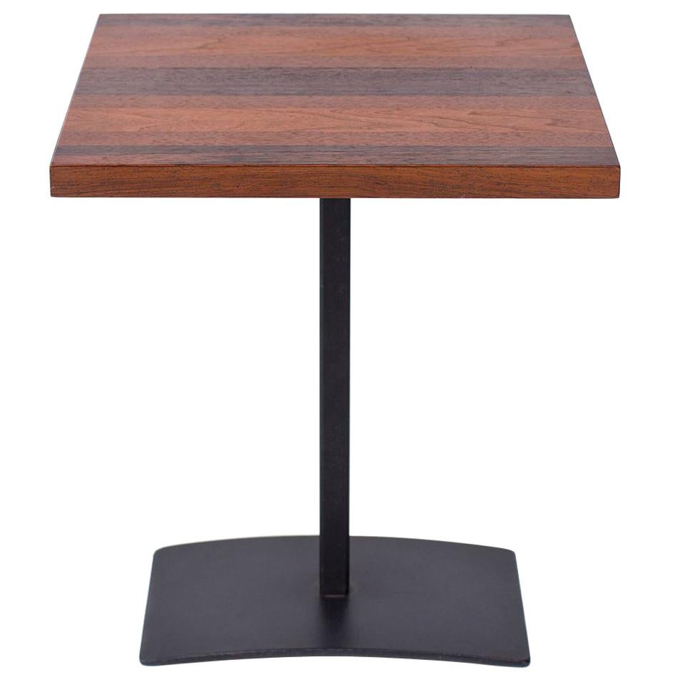 Milo Baughman for Thayer Coggin iron and wood side tables circa early 1970s. These seldom seen examples have walnut, maple, oak and rosewood tops with iron bases. Price listed is per table.