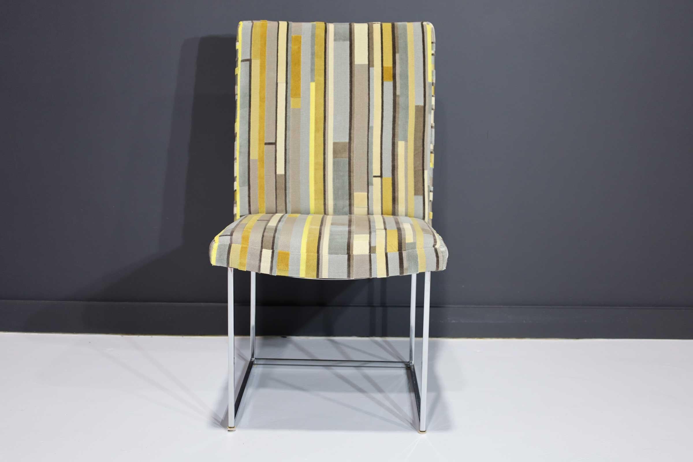 Newly upholstered in a striking velvet fabric by Maharam. Grays, browns, nutmeg and pops of yellow. Up to 8 available.