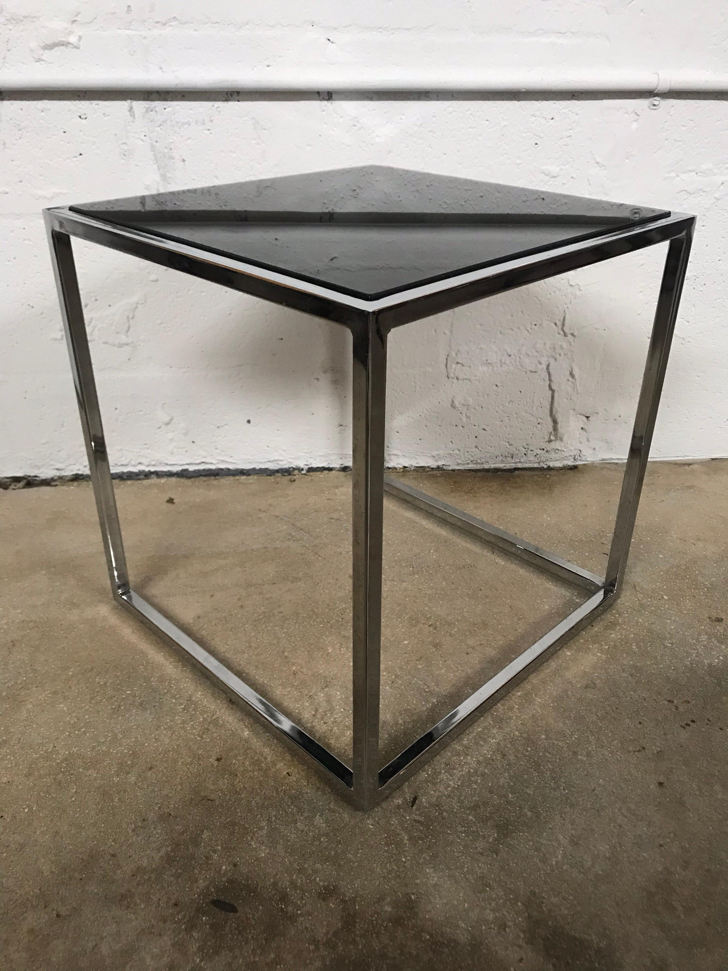 Thinline side end or occasional table in the style of Milo Baughman rendered in chrome-plated steel with a black glass top.
