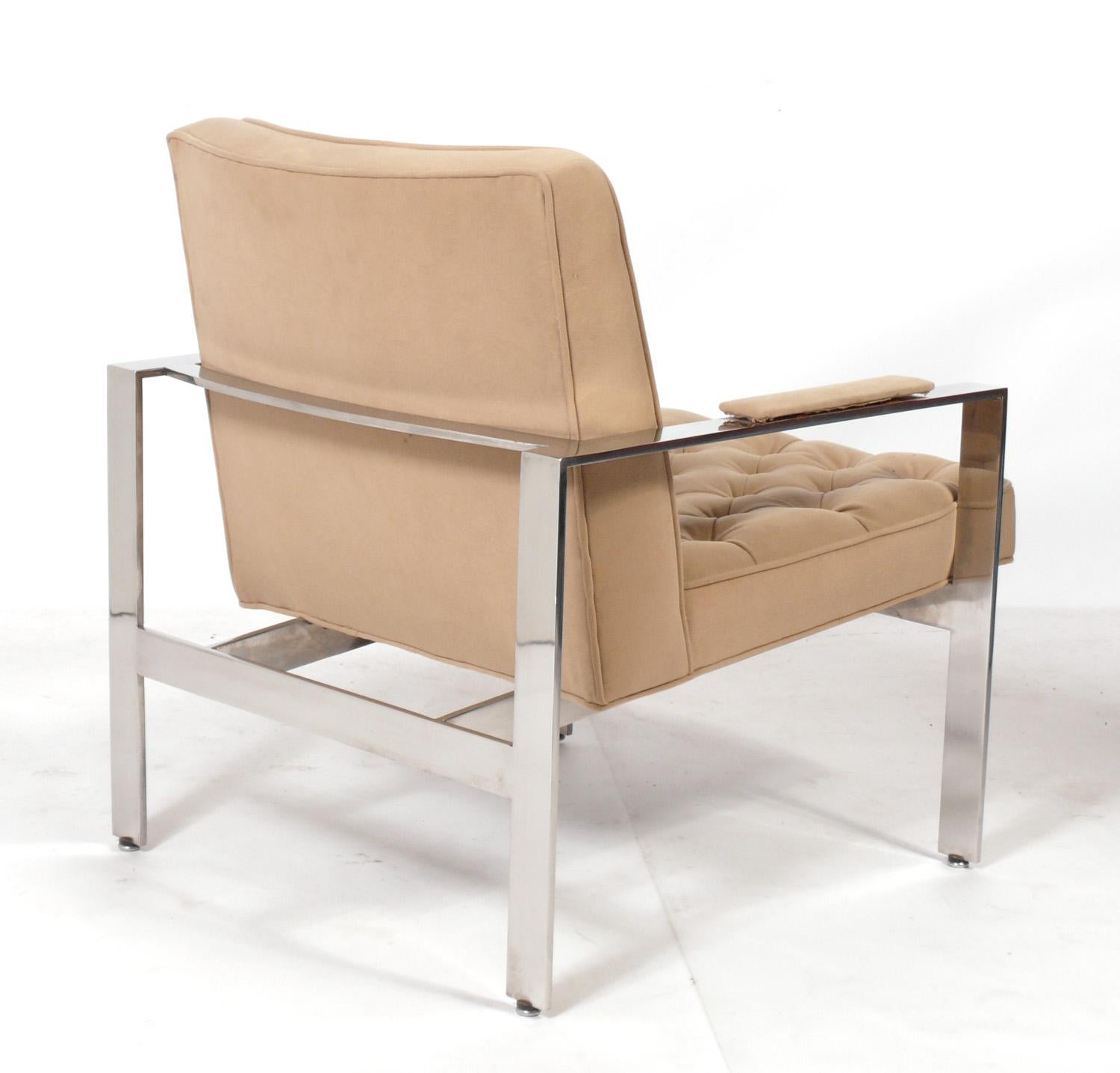 Clean Lined Tufted Chrome Lounge Chair, designed by Milo Baughman, American, circa 1960s. It is very heavy and well made. This chair is currently being reupholstered and can be completed in your fabric. SImply send us 4 yards of your fabric after