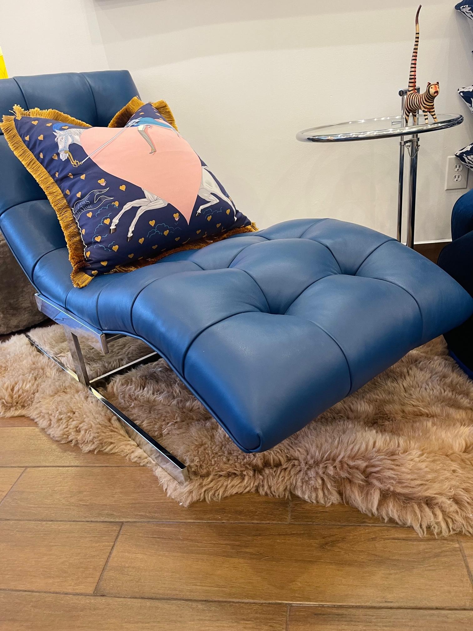 Original Milo Baughman Wave Chaise reupholstered in a rich blue Italian calfskin leather. The sleek design is perfect for daytime contemplations or night-time relaxation. The wave design and shape contours to a resting body and offers superior