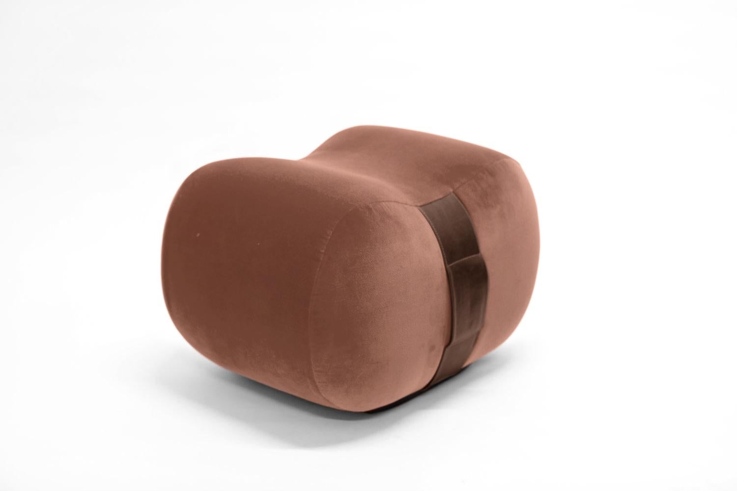 The Milo Bean, you can sit on it, lean against it, and carry it. This fun, colorful, curvy design by Marie Burgos may be the ultimate in portable seating. Crafted in plush fabrics with leather accent handles The Milo Bean offers style, convenience