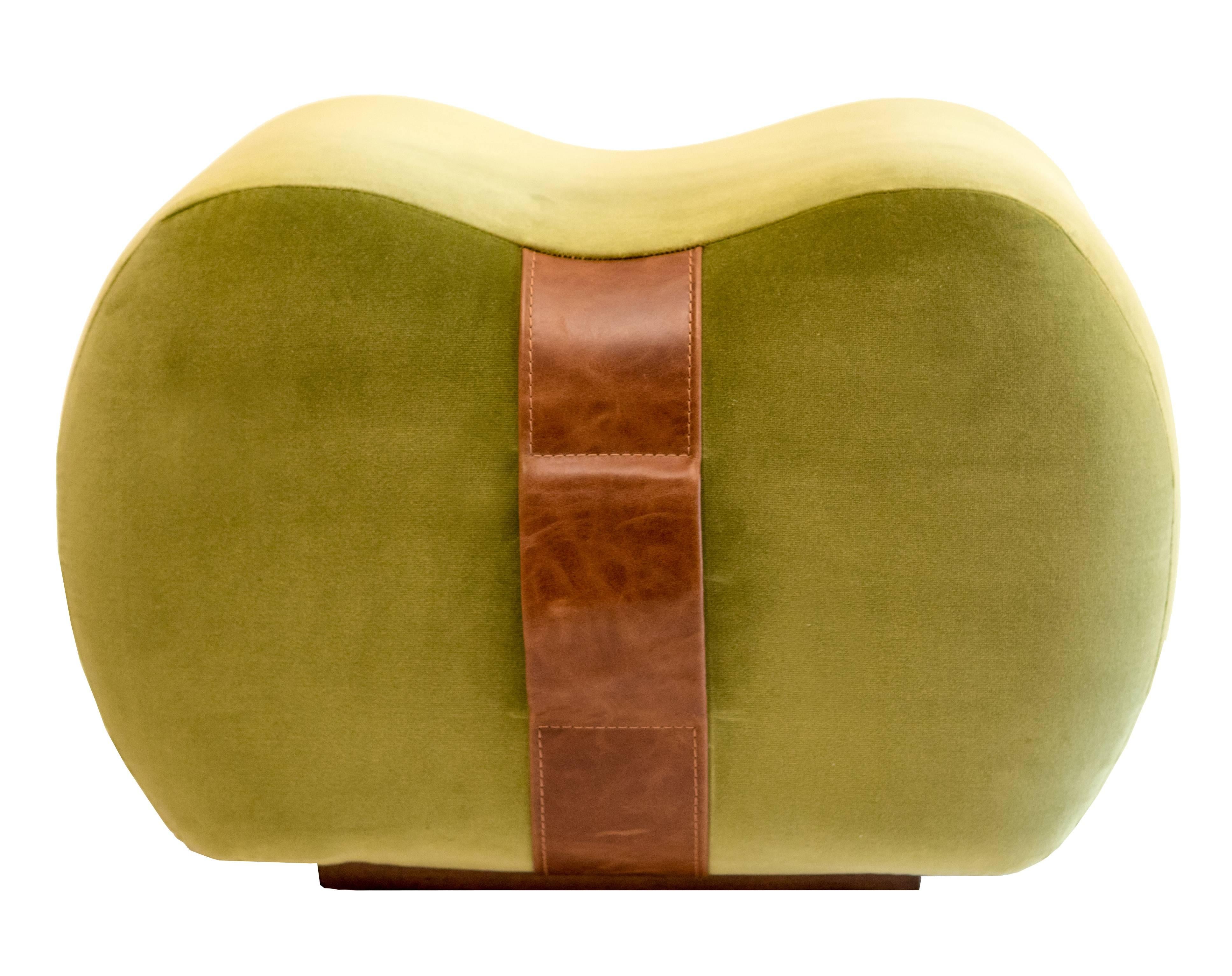 The Milo Bean, you can sit on it, lean against it and carry it. This fun, colorful, curvy design by Marie Burgos may be the ultimate in portable seating. Crafted in plush fabrics with leather accent handles The Milo Bean offers style, convenience