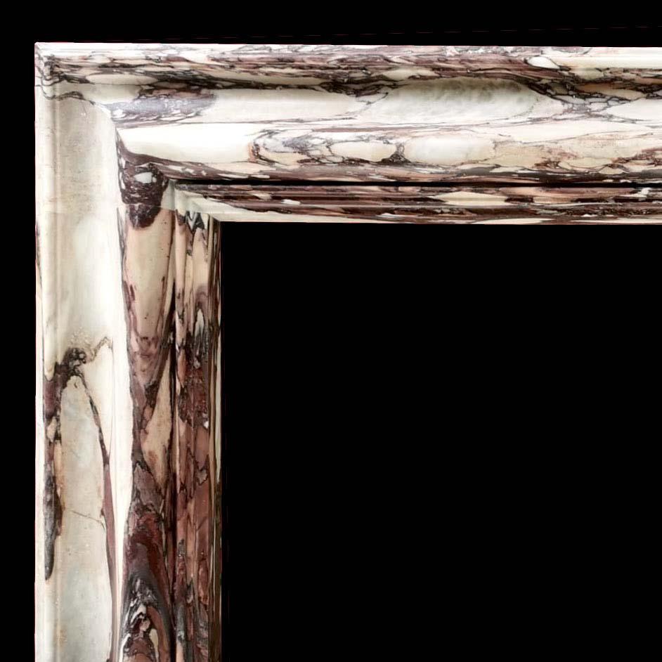 Limited Edition Milo bolection mantel, hand-carved in X with honed finish. 
Measures: Opening of Mantel: 43