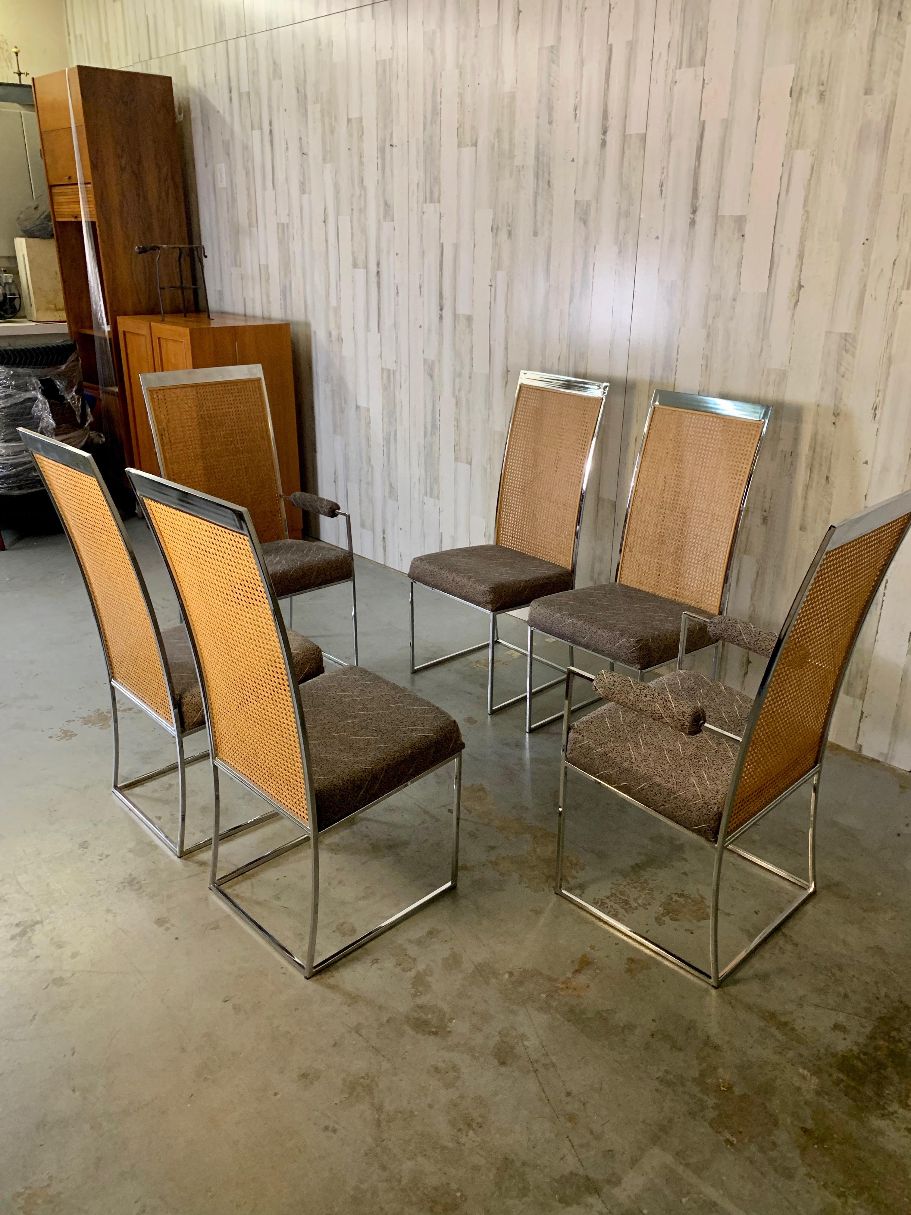 Chrome high back dining chairs with cane back and original upholstery.
Deigned by Milo Baughman and manufactured by Thayer Coggin. 
The fabric is very clean or new upholstery may be desired. 

Measures: Arm chair 21.5 