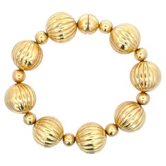 Bracelet italien de créateurs avec boule magnétique en or jaune 14 carats, 31,2 grammes