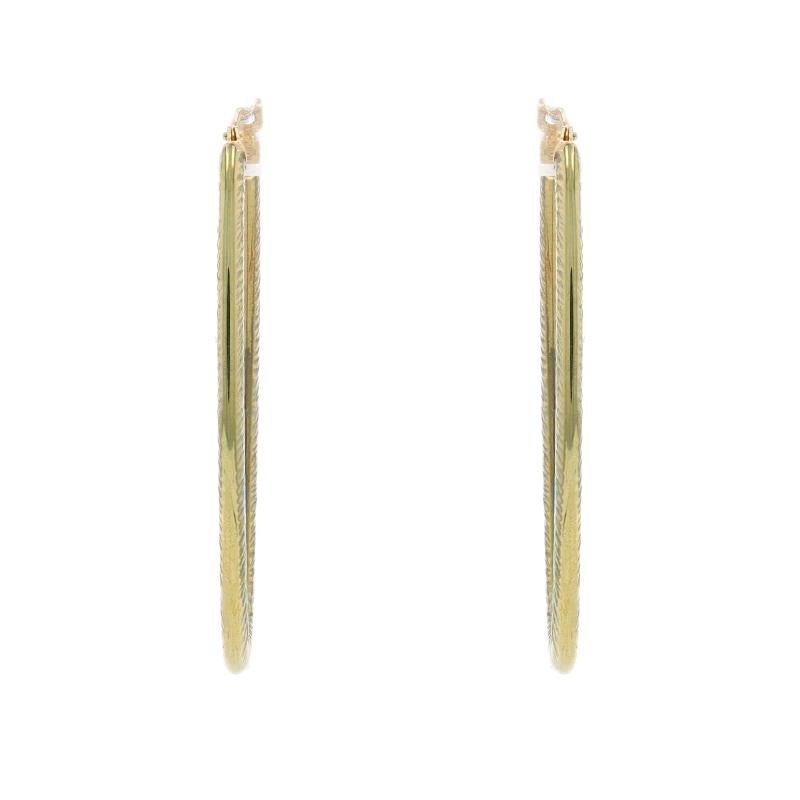 Brand: Milor

Metal Content: 14k Green Gold & 14k Yellow Gold

Style: Oval Hoop
Fastening Type: Snap Closures
Theme: Stripes
Features: Hollow construction for comfortable, all-day wear

Measurements

Tall: 1 13/16