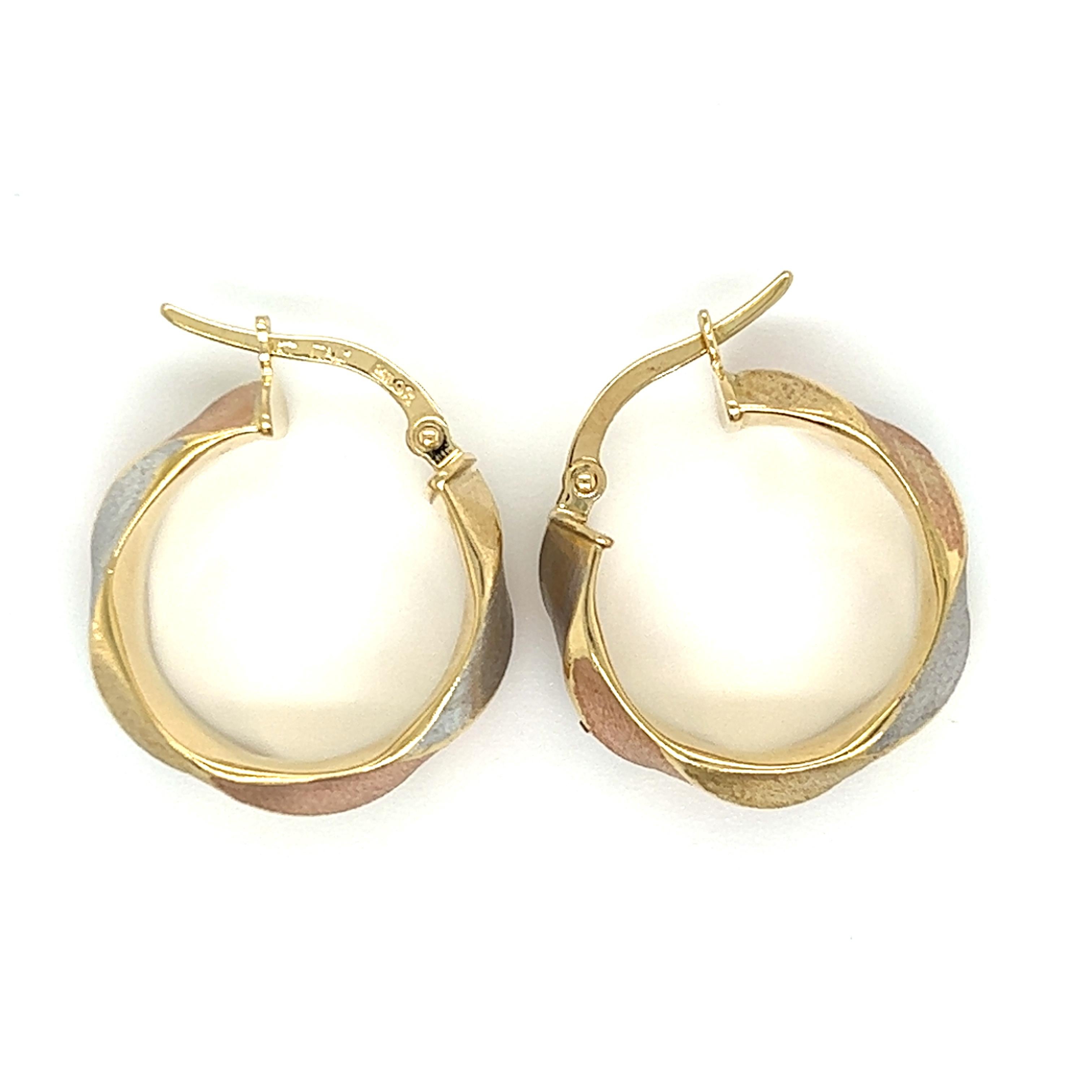 One pair of 14-karat yellow, white and rose gold hoops, designed by Milor Italy, measuring 20.65mm in diameter and 7.5mm wide.  The earrings are stamped 