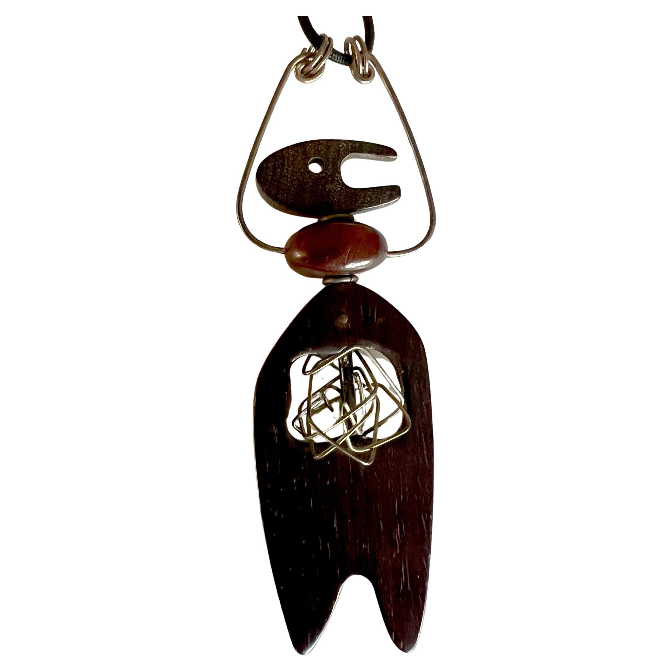 Milton Cavagnaro California Abstract Modernist Wooden Man Pendant on Cord For Sale